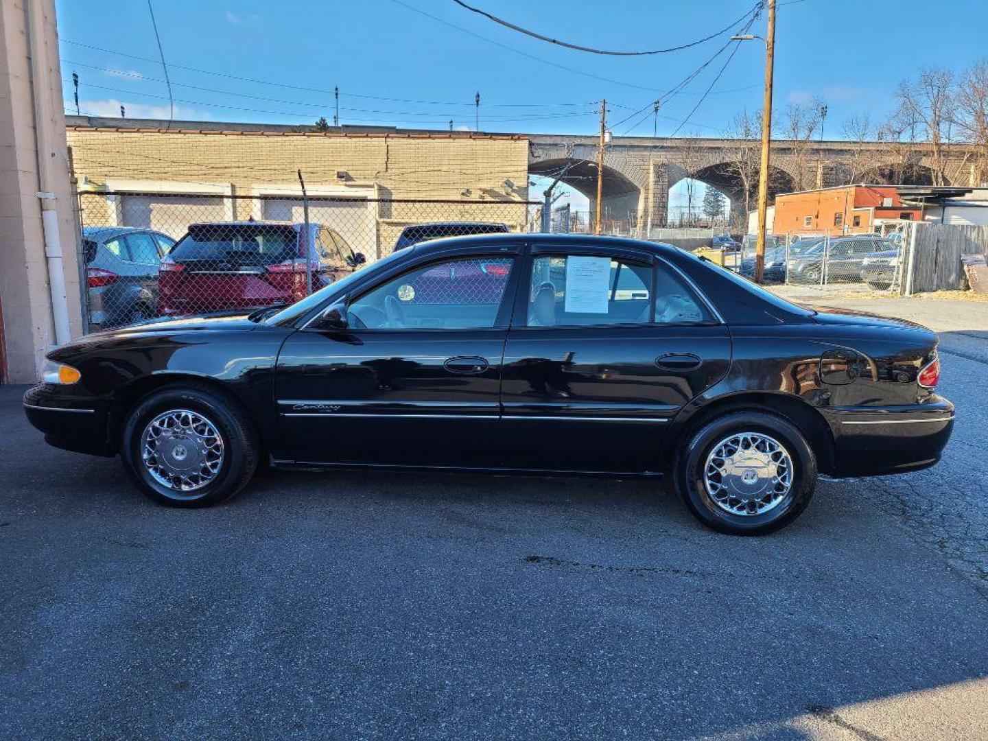 2001 BLACK BUICK CENTURY LIMITED (2G4WY55J211) with an 3.1L engine, Automatic transmission, located at 117 North Cameron Street, Harrisburg, PA, 17101, (717) 963-8962, 40.267021, -76.875351 - WE FINANCE!!! Good Credit/ Bad Credit/ No Credit - ALL Trade-Ins Welcomed!!! ***Guaranteed Credit Approval*** APPLY ONLINE or CALL us TODAY ;) Internet Prices and Marketplace Prices are SPECIAL discounted ***CASH DEALS*** Retail Prices are higher. Please call us to discuss your cash and finan - Photo#1