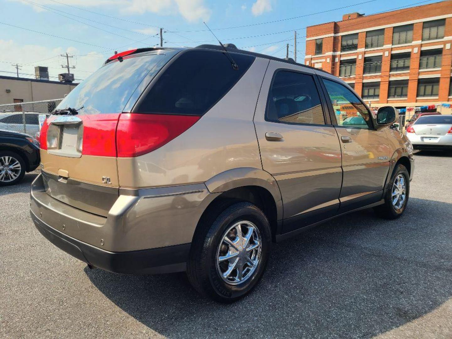 2002 TAN BUICK RENDEZVOUS CX (3G5DB03E32S) with an 3.4L engine, Automatic transmission, located at 117 North Cameron Street, Harrisburg, PA, 17101, (717) 963-8962, 40.267021, -76.875351 - WE FINANCE!!! Good Credit/ Bad Credit/ No Credit - ALL Trade-Ins Welcomed!!! ***Guaranteed Credit Approval*** APPLY ONLINE or CALL us TODAY ;) Internet Prices and Marketplace Prices are SPECIAL discounted ***CASH DEALS*** Retail Prices are higher. Please call us to discuss your cash and finan - Photo#4