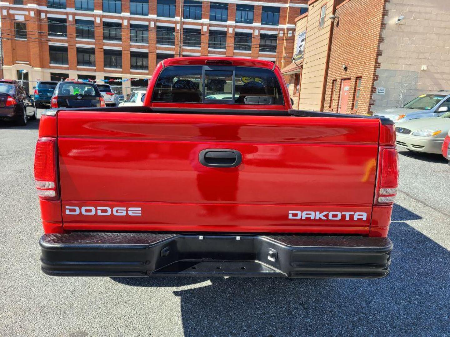 2003 RED DODGE DAKOTA SXT (1D7GG16X23S) with an 3.9L engine, Automatic transmission, located at 117 North Cameron Street, Harrisburg, PA, 17101, (717) 963-8962, 40.267021, -76.875351 - WE FINANCE!!! Good Credit/ Bad Credit/ No Credit - ALL Trade-Ins Welcomed!!! ***Guaranteed Credit Approval*** APPLY ONLINE or CALL us TODAY ;) Internet Prices and Marketplace Prices are SPECIAL discounted ***CASH DEALS*** Retail Prices are higher. Please call us to discuss your cash and finan - Photo#3