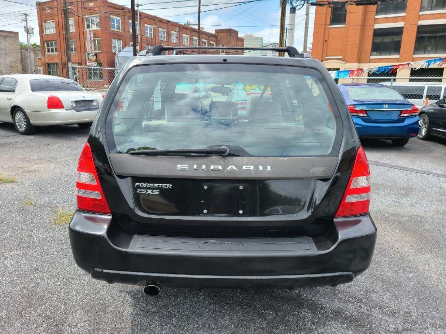 2004 BLACK SUBARU FORESTER 2.5XS (JF1SG65664H) with an 2.5L engine, Automatic transmission, located at 117 North Cameron Street, Harrisburg, PA, 17101, (717) 963-8962, 40.267021, -76.875351 - WE FINANCE!!! Good Credit/ Bad Credit/ No Credit - ALL Trade-Ins Welcomed!!! ***Guaranteed Credit Approval*** APPLY ONLINE or CALL us TODAY ;) Internet Prices and Marketplace Prices are SPECIAL discounted ***CASH DEALS*** Retail Prices are higher. Please call us to discuss your cash and finan - Photo#3