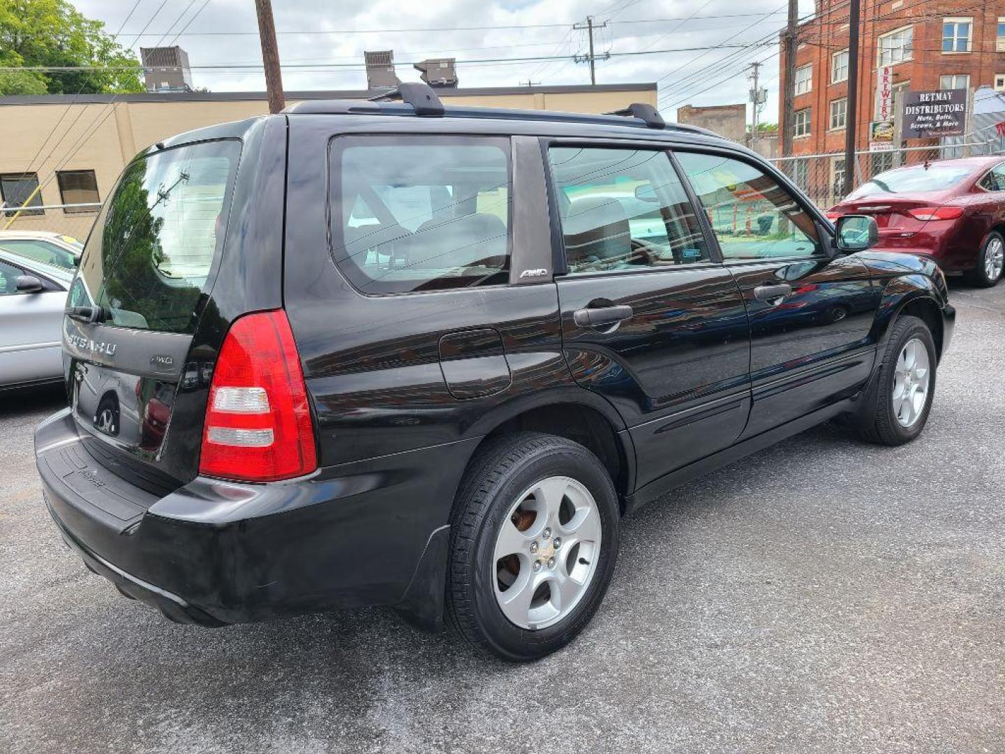 2004 BLACK SUBARU FORESTER 2.5XS (JF1SG65664H) with an 2.5L engine, Automatic transmission, located at 117 North Cameron Street, Harrisburg, PA, 17101, (717) 963-8962, 40.267021, -76.875351 - WE FINANCE!!! Good Credit/ Bad Credit/ No Credit - ALL Trade-Ins Welcomed!!! ***Guaranteed Credit Approval*** APPLY ONLINE or CALL us TODAY ;) Internet Prices and Marketplace Prices are SPECIAL discounted ***CASH DEALS*** Retail Prices are higher. Please call us to discuss your cash and finan - Photo#4