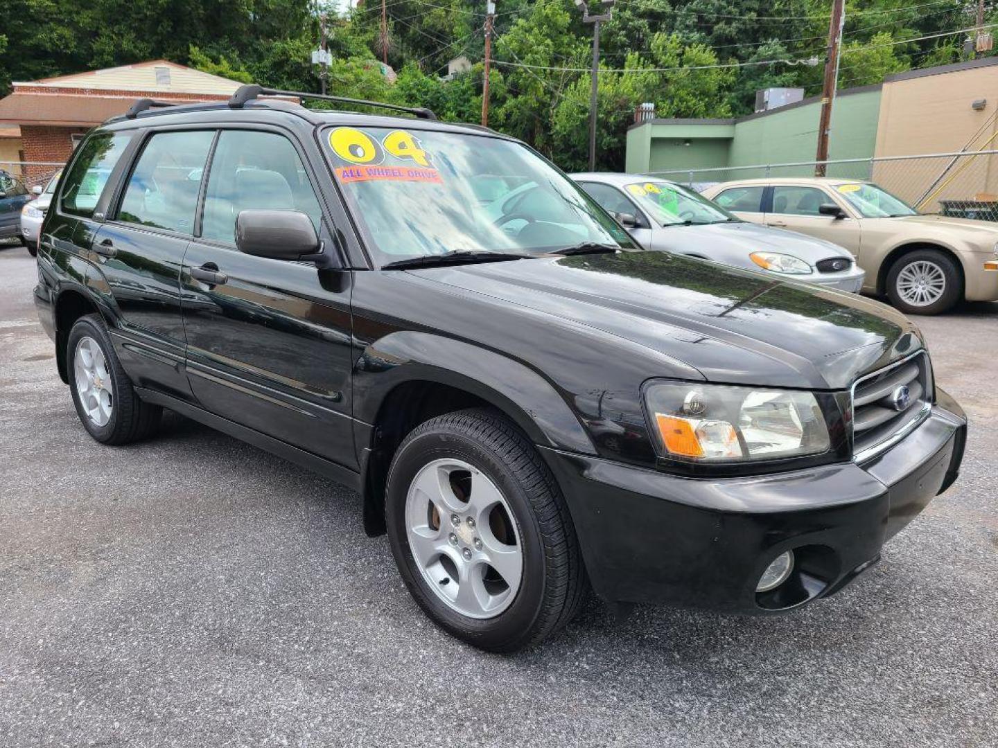 2004 BLACK SUBARU FORESTER 2.5XS (JF1SG65664H) with an 2.5L engine, Automatic transmission, located at 117 North Cameron Street, Harrisburg, PA, 17101, (717) 963-8962, 40.267021, -76.875351 - WE FINANCE!!! Good Credit/ Bad Credit/ No Credit - ALL Trade-Ins Welcomed!!! ***Guaranteed Credit Approval*** APPLY ONLINE or CALL us TODAY ;) Internet Prices and Marketplace Prices are SPECIAL discounted ***CASH DEALS*** Retail Prices are higher. Please call us to discuss your cash and finan - Photo#6