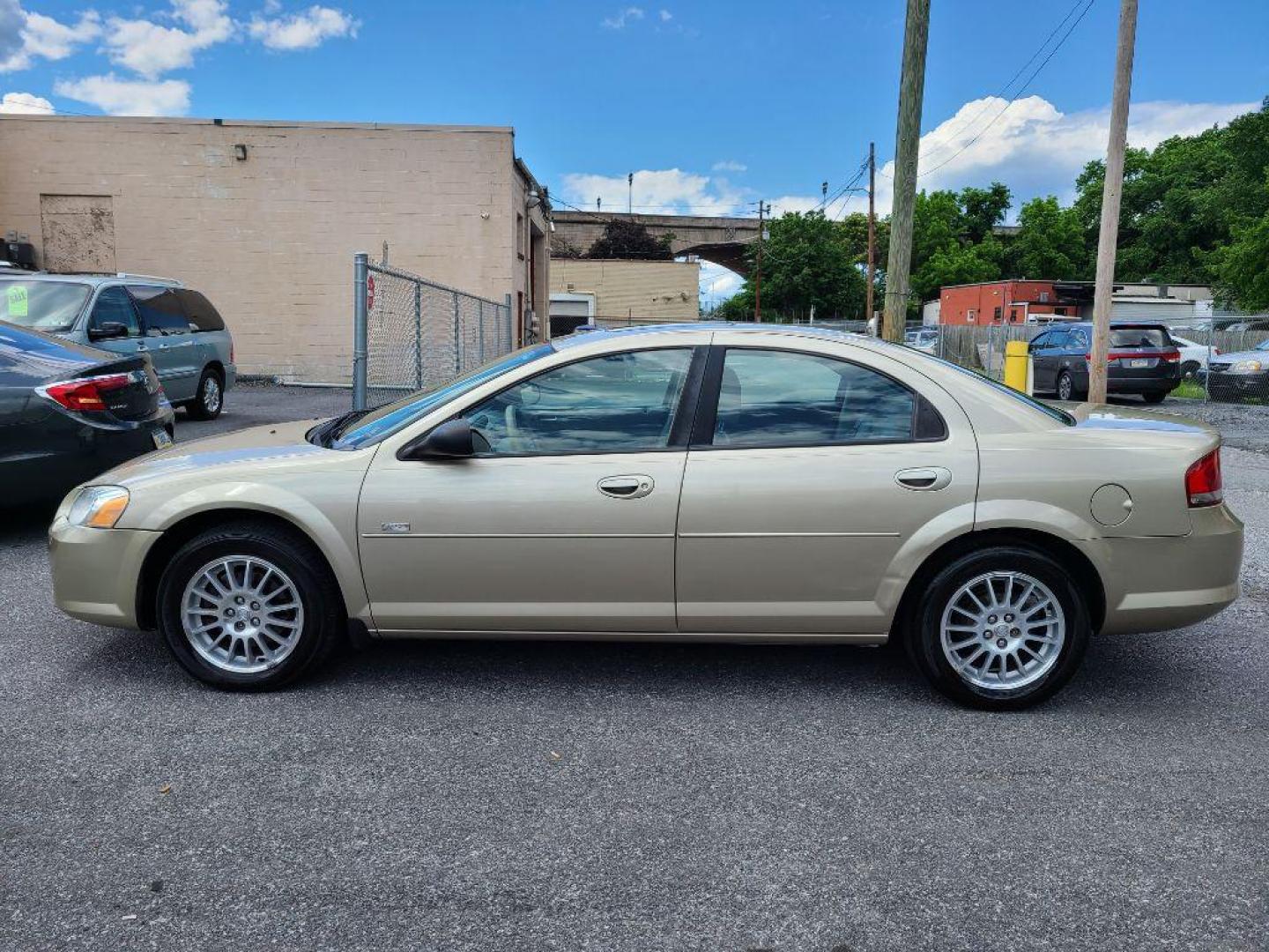 2005 GOLD CHRYSLER SEBRING TOURING (1C3EL56R55N) with an 2.7L engine, Automatic transmission, located at 117 North Cameron Street, Harrisburg, PA, 17101, (717) 963-8962, 40.267021, -76.875351 - WE FINANCE!!! Good Credit/ Bad Credit/ No Credit - ALL Trade-Ins Welcomed!!! ***Guaranteed Credit Approval*** APPLY ONLINE or CALL us TODAY ;) Internet Prices and Marketplace Prices are SPECIAL discounted ***CASH DEALS*** Retail Prices are higher. Please call us to discuss your cash and finan - Photo#1