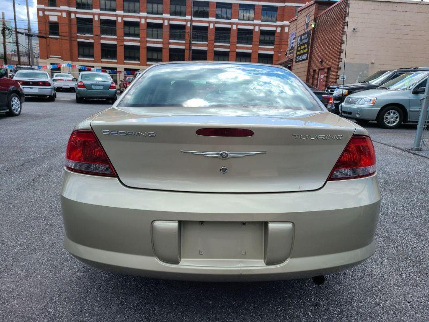 2005 GOLD CHRYSLER SEBRING TOURING (1C3EL56R55N) with an 2.7L engine, Automatic transmission, located at 117 North Cameron Street, Harrisburg, PA, 17101, (717) 963-8962, 40.267021, -76.875351 - WE FINANCE!!! Good Credit/ Bad Credit/ No Credit - ALL Trade-Ins Welcomed!!! ***Guaranteed Credit Approval*** APPLY ONLINE or CALL us TODAY ;) Internet Prices and Marketplace Prices are SPECIAL discounted ***CASH DEALS*** Retail Prices are higher. Please call us to discuss your cash and finan - Photo#3