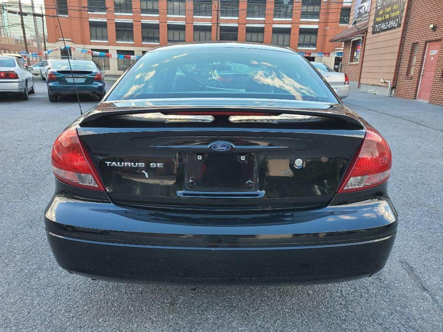 2005 BLACK FORD TAURUS SE (1FAHP53255A) with an 3.0L engine, Automatic transmission, located at 117 North Cameron Street, Harrisburg, PA, 17101, (717) 963-8962, 40.267021, -76.875351 - WE FINANCE!!! Good Credit/ Bad Credit/ No Credit - ALL Trade-Ins Welcomed!!! ***Guaranteed Credit Approval*** APPLY ONLINE or CALL us TODAY ;) Internet Prices and Marketplace Prices are SPECIAL discounted ***CASH DEALS*** Retail Prices are higher. Please call us to discuss your cash and finan - Photo#3