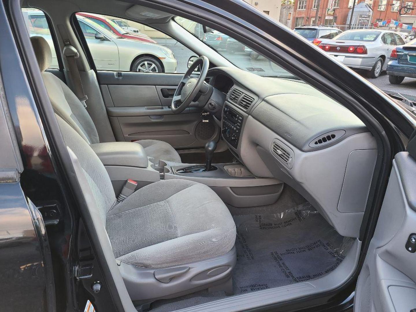 2005 BLACK FORD TAURUS SE (1FAHP53255A) with an 3.0L engine, Automatic transmission, located at 117 North Cameron Street, Harrisburg, PA, 17101, (717) 963-8962, 40.267021, -76.875351 - WE FINANCE!!! Good Credit/ Bad Credit/ No Credit - ALL Trade-Ins Welcomed!!! ***Guaranteed Credit Approval*** APPLY ONLINE or CALL us TODAY ;) Internet Prices and Marketplace Prices are SPECIAL discounted ***CASH DEALS*** Retail Prices are higher. Please call us to discuss your cash and finan - Photo#8