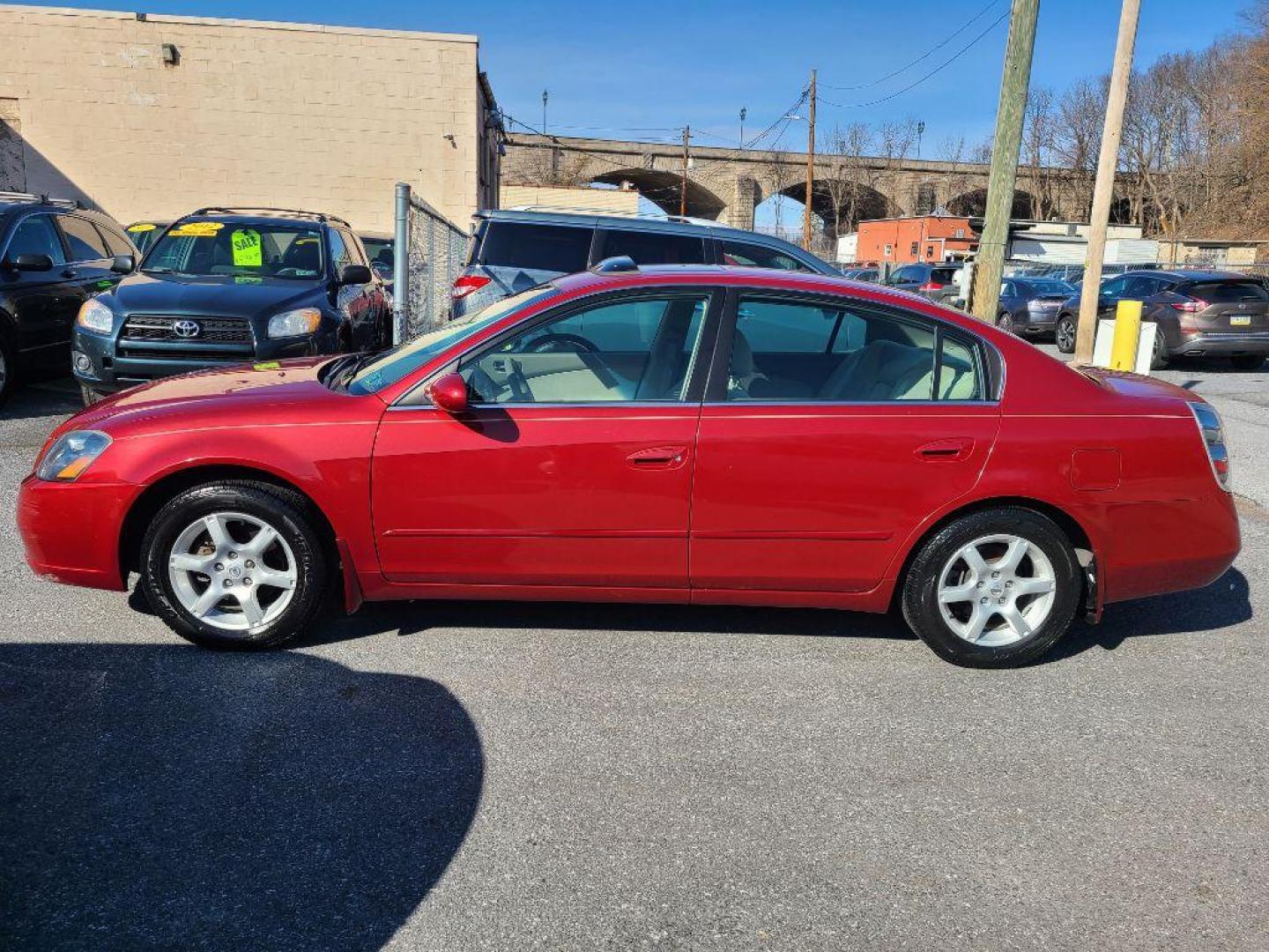 2005 RED NISSAN ALTIMA S (1N4AL11D45C) with an 2.5L engine, Automatic transmission, located at 7981 Paxton Street, Harrisburg, PA, 17111, (717) 561-2926, 40.261490, -76.749229 - WE FINANCE!!! Good Credit/ Bad Credit/ No Credit - ALL Trade-Ins Welcomed!!! ***Guaranteed Credit Approval*** APPLY ONLINE or CALL us TODAY ;) Internet Prices and Marketplace Prices are SPECIAL discounted ***CASH DEALS*** Retail Prices are higher. Please call us to discuss your cash and finan - Photo#1