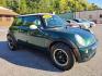 2006 GREEN MINI COOPER HATCHBACK (WMWRC33576T) with an 1.6L engine, Continuously Variable transmission, located at 117 North Cameron Street, Harrisburg, PA, 17101, (717) 963-8962, 40.267021, -76.875351 - WE FINANCE!!! Good Credit/ Bad Credit/ No Credit - ALL Trade-Ins Welcomed!!! ***Guaranteed Credit Approval*** APPLY ONLINE or CALL us TODAY ;) Internet Prices and Marketplace Prices are SPECIAL discounted ***CASH DEALS*** Retail Prices are higher. Please call us to discuss your cash and finan - Photo#6