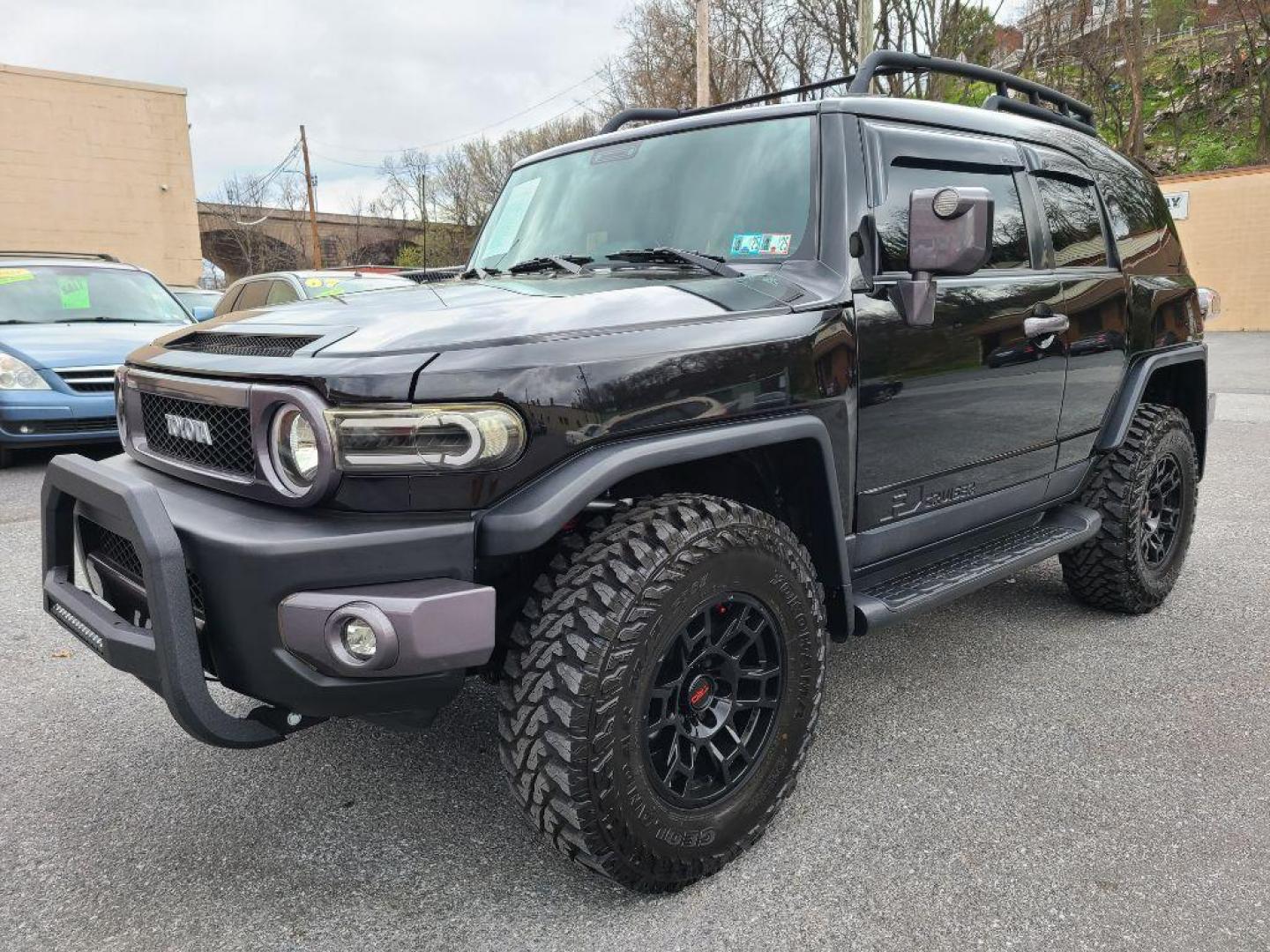 2007 BLACK TOYOTA FJ CRUISER UTILITY (JTEBU11F270) with an 4.0L engine, Automatic transmission, located at 117 North Cameron Street, Harrisburg, PA, 17101, (717) 963-8962, 40.267021, -76.875351 - CASH DEAL $22,995 - Photo#0