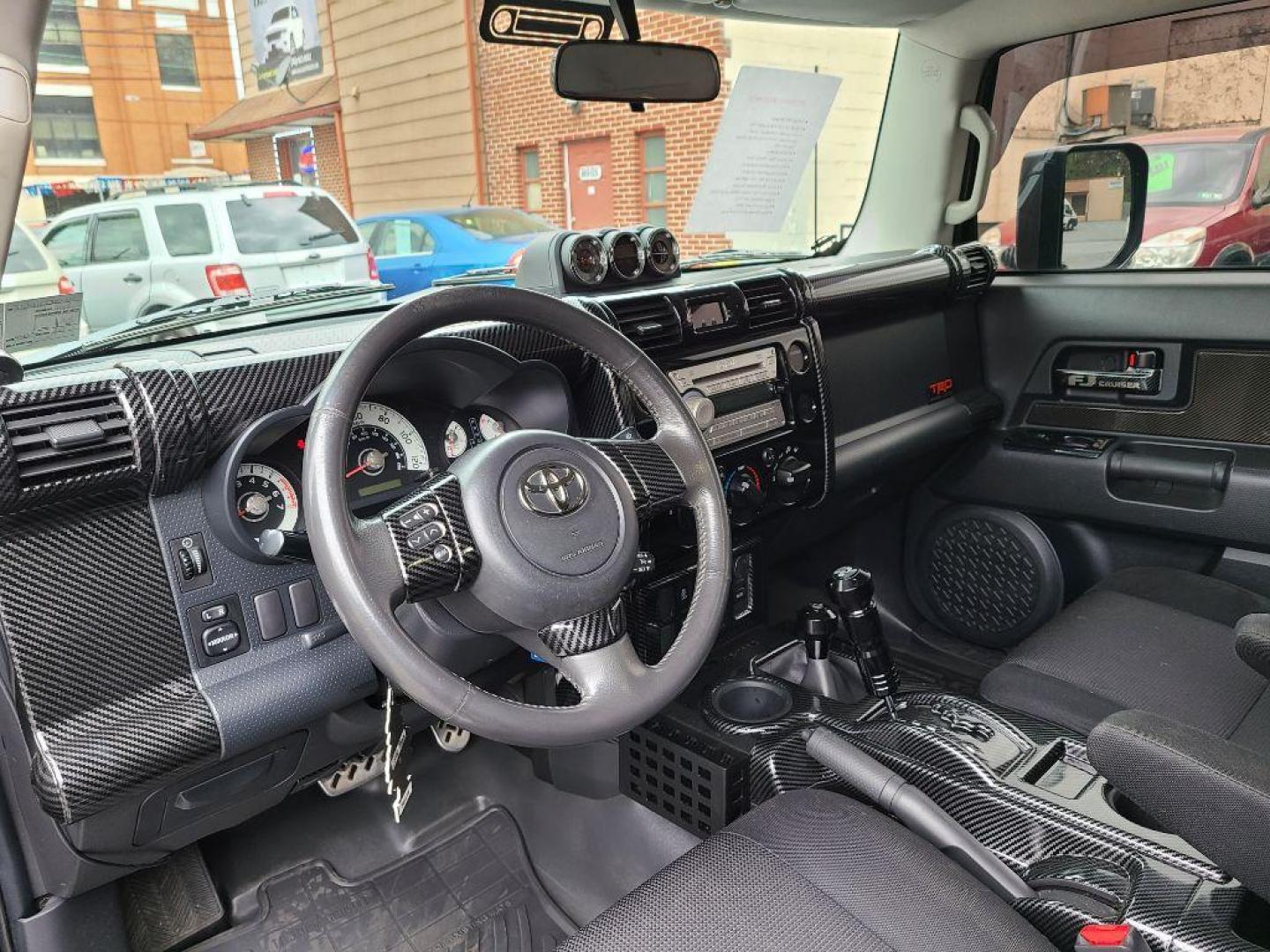 2007 BLACK TOYOTA FJ CRUISER UTILITY (JTEBU11F270) with an 4.0L engine, Automatic transmission, located at 117 North Cameron Street, Harrisburg, PA, 17101, (717) 963-8962, 40.267021, -76.875351 - CASH DEAL $22,995 - Photo#14