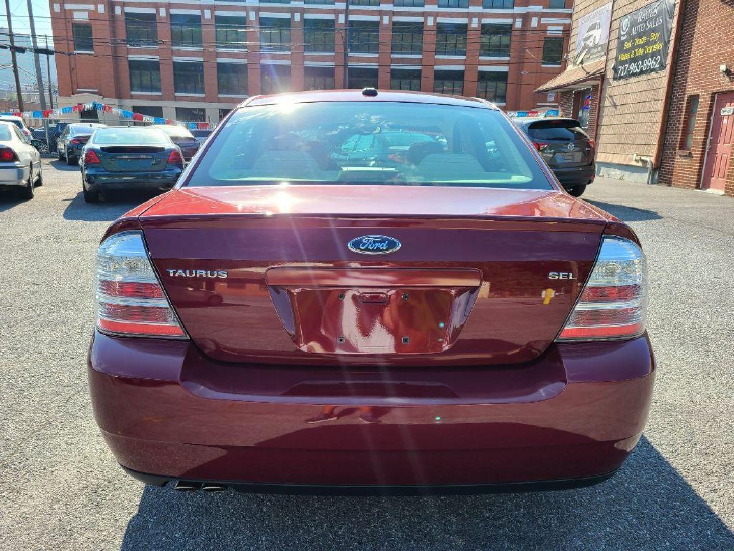 2008 RED FORD TAURUS SEL (1FAHP24W88G) with an 3.5L engine, Automatic transmission, located at 117 North Cameron Street, Harrisburg, PA, 17101, (717) 963-8962, 40.267021, -76.875351 - WE FINANCE!!! Good Credit/ Bad Credit/ No Credit - ALL Trade-Ins Welcomed!!! ***Guaranteed Credit Approval*** APPLY ONLINE or CALL us TODAY ;) Internet Prices and Marketplace Prices are SPECIAL discounted ***CASH DEALS*** Retail Prices are higher. Please call us to discuss your cash and finan - Photo#3