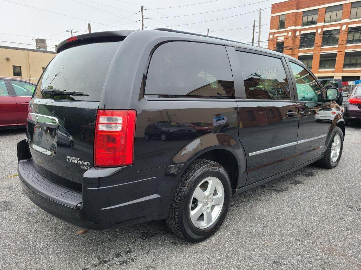 2010 BLACK DODGE GRAND CARAVAN SXT (2D4RN5DX6AR) with an 4.0L engine, Automatic transmission, located at 117 North Cameron Street, Harrisburg, PA, 17101, (717) 963-8962, 40.267021, -76.875351 - WE FINANCE!!! Good Credit/ Bad Credit/ No Credit - ALL Trade-Ins Welcomed!!! ***Guaranteed Credit Approval*** APPLY ONLINE or CALL us TODAY ;) Internet Prices and Marketplace Prices are SPECIAL discounted ***CASH DEALS*** Retail Prices are higher. Please call us to discuss your cash and finan - Photo#4