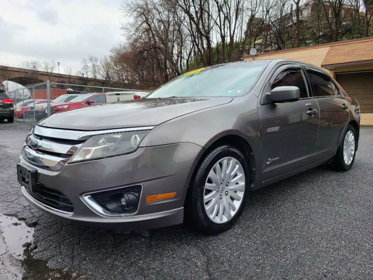 2010 GRAY FORD FUSION HYBRID (3FADP0L35AR) with an 2.5L engine, Continuously Variable transmission, located at 117 North Cameron Street, Harrisburg, PA, 17101, (717) 963-8962, 40.267021, -76.875351 - WE FINANCE!!! Good Credit/ Bad Credit/ No Credit - ALL Trade-Ins Welcomed!!! ***Guaranteed Credit Approval*** APPLY ONLINE or CALL us TODAY ;) Internet Prices and Marketplace Prices are SPECIAL discounted ***CASH DEALS*** Retail Prices are higher. Please call us to discuss your cash and finan - Photo#0