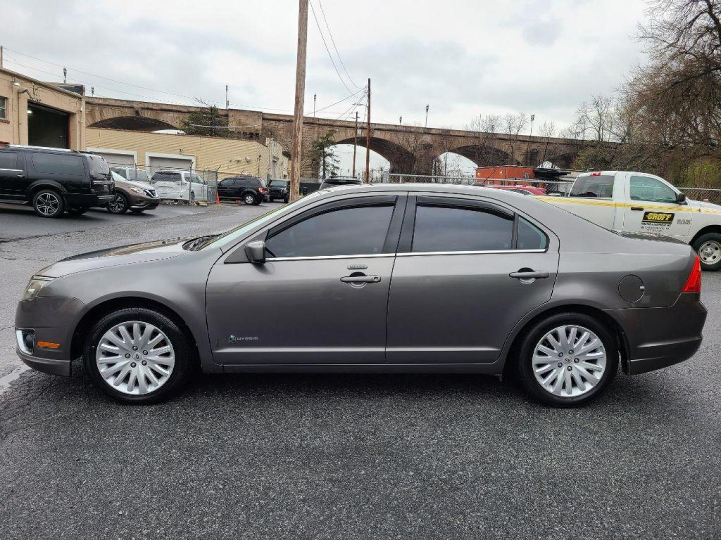 2010 GRAY FORD FUSION HYBRID (3FADP0L35AR) with an 2.5L engine, Continuously Variable transmission, located at 117 North Cameron Street, Harrisburg, PA, 17101, (717) 963-8962, 40.267021, -76.875351 - WE FINANCE!!! Good Credit/ Bad Credit/ No Credit - ALL Trade-Ins Welcomed!!! ***Guaranteed Credit Approval*** APPLY ONLINE or CALL us TODAY ;) Internet Prices and Marketplace Prices are SPECIAL discounted ***CASH DEALS*** Retail Prices are higher. Please call us to discuss your cash and finan - Photo#1