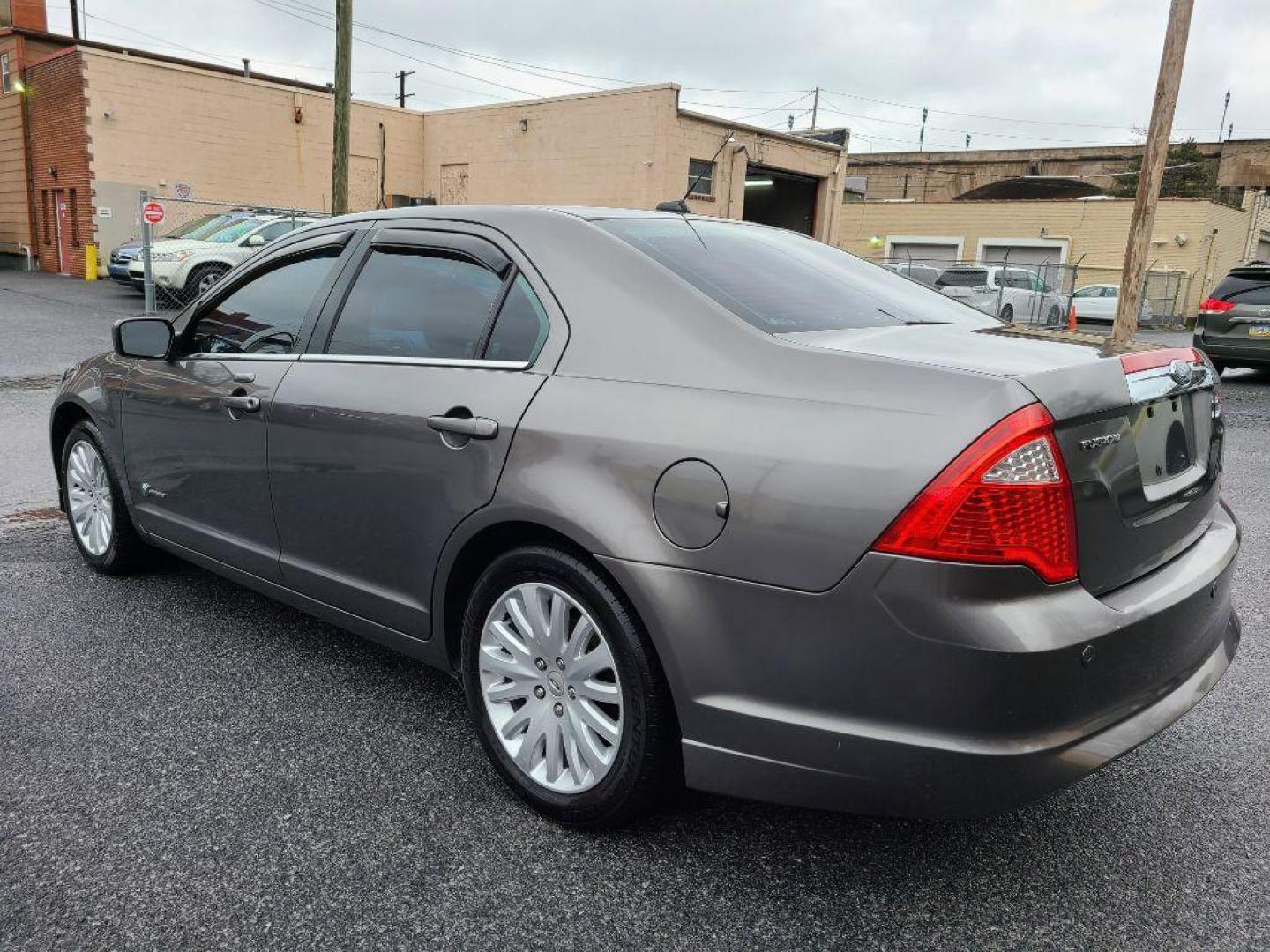 2010 GRAY FORD FUSION HYBRID (3FADP0L35AR) with an 2.5L engine, Continuously Variable transmission, located at 117 North Cameron Street, Harrisburg, PA, 17101, (717) 963-8962, 40.267021, -76.875351 - WE FINANCE!!! Good Credit/ Bad Credit/ No Credit - ALL Trade-Ins Welcomed!!! ***Guaranteed Credit Approval*** APPLY ONLINE or CALL us TODAY ;) Internet Prices and Marketplace Prices are SPECIAL discounted ***CASH DEALS*** Retail Prices are higher. Please call us to discuss your cash and finan - Photo#2