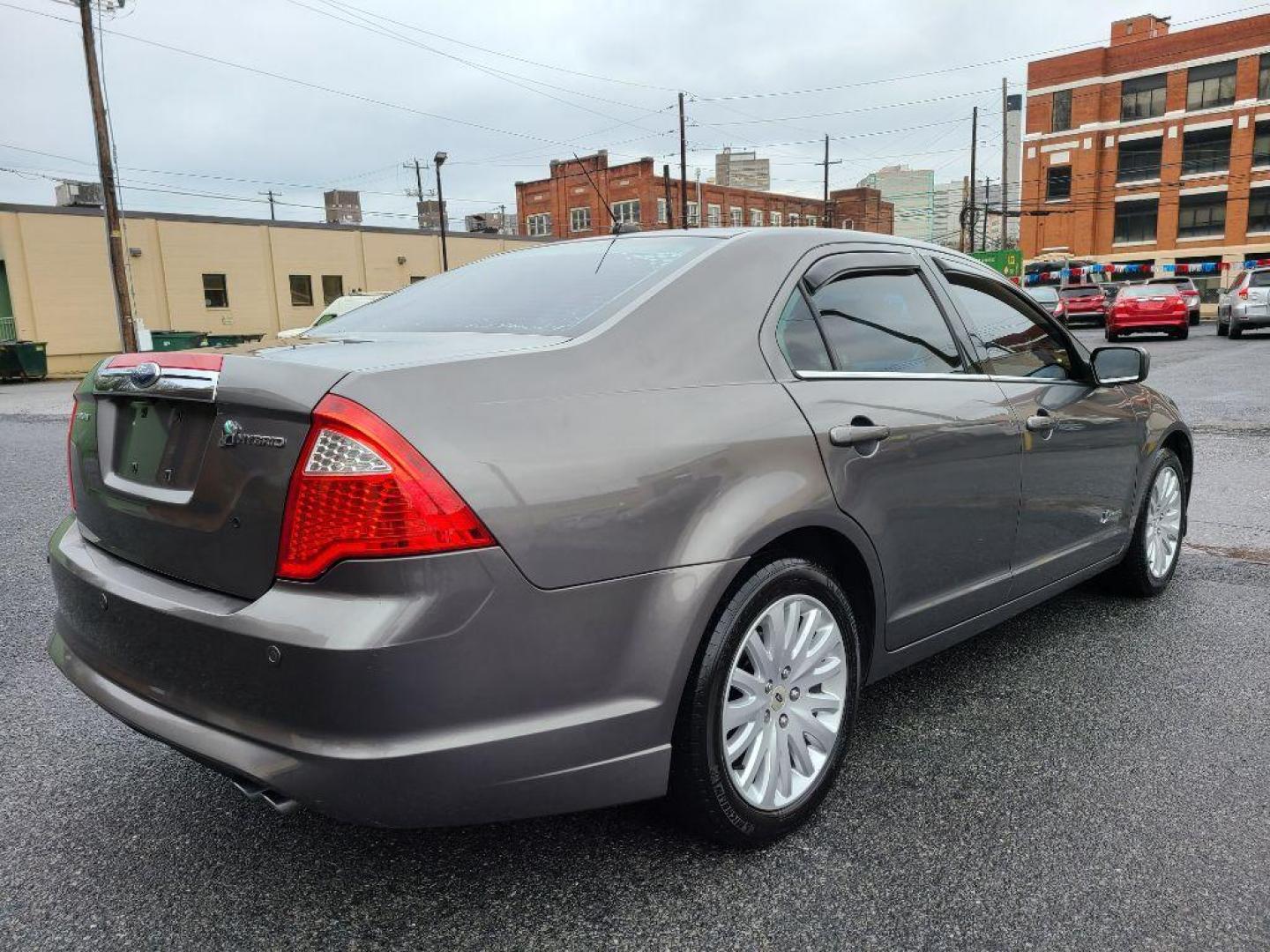 2010 GRAY FORD FUSION HYBRID (3FADP0L35AR) with an 2.5L engine, Continuously Variable transmission, located at 117 North Cameron Street, Harrisburg, PA, 17101, (717) 963-8962, 40.267021, -76.875351 - WE FINANCE!!! Good Credit/ Bad Credit/ No Credit - ALL Trade-Ins Welcomed!!! ***Guaranteed Credit Approval*** APPLY ONLINE or CALL us TODAY ;) Internet Prices and Marketplace Prices are SPECIAL discounted ***CASH DEALS*** Retail Prices are higher. Please call us to discuss your cash and finan - Photo#4