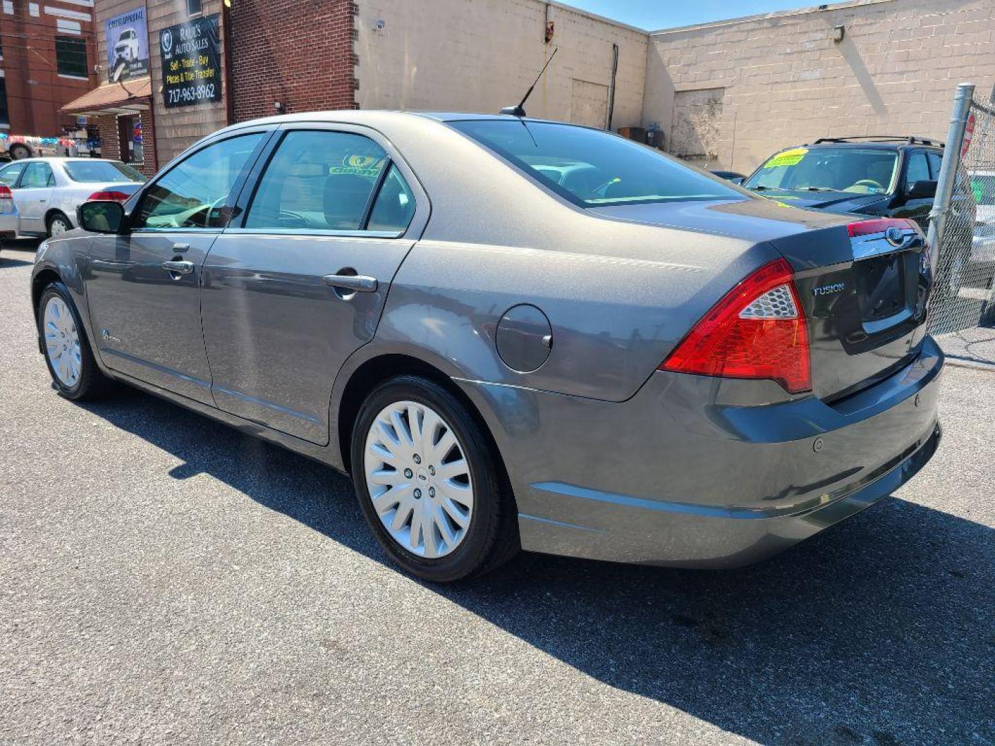 2010 GRAY FORD FUSION HYBRID (3FADP0L37AR) with an 2.5L engine, Continuously Variable transmission, located at 117 North Cameron Street, Harrisburg, PA, 17101, (717) 963-8962, 40.267021, -76.875351 - WE FINANCE!!! Good Credit/ Bad Credit/ No Credit - ALL Trade-Ins Welcomed!!! ***Guaranteed Credit Approval*** APPLY ONLINE or CALL us TODAY ;) Internet Prices and Marketplace Prices are SPECIAL discounted ***CASH DEALS*** Retail Prices are higher. Please call us to discuss your cash and finan - Photo#2