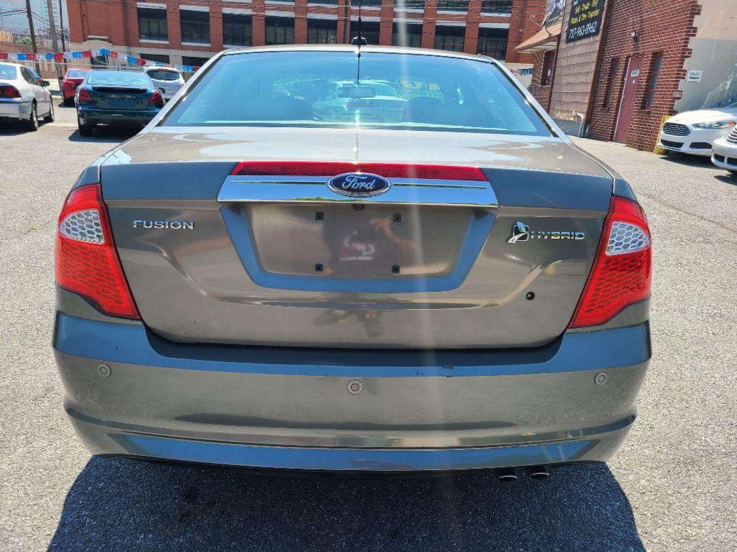 2010 GRAY FORD FUSION HYBRID (3FADP0L37AR) with an 2.5L engine, Continuously Variable transmission, located at 117 North Cameron Street, Harrisburg, PA, 17101, (717) 963-8962, 40.267021, -76.875351 - WE FINANCE!!! Good Credit/ Bad Credit/ No Credit - ALL Trade-Ins Welcomed!!! ***Guaranteed Credit Approval*** APPLY ONLINE or CALL us TODAY ;) Internet Prices and Marketplace Prices are SPECIAL discounted ***CASH DEALS*** Retail Prices are higher. Please call us to discuss your cash and finan - Photo#3