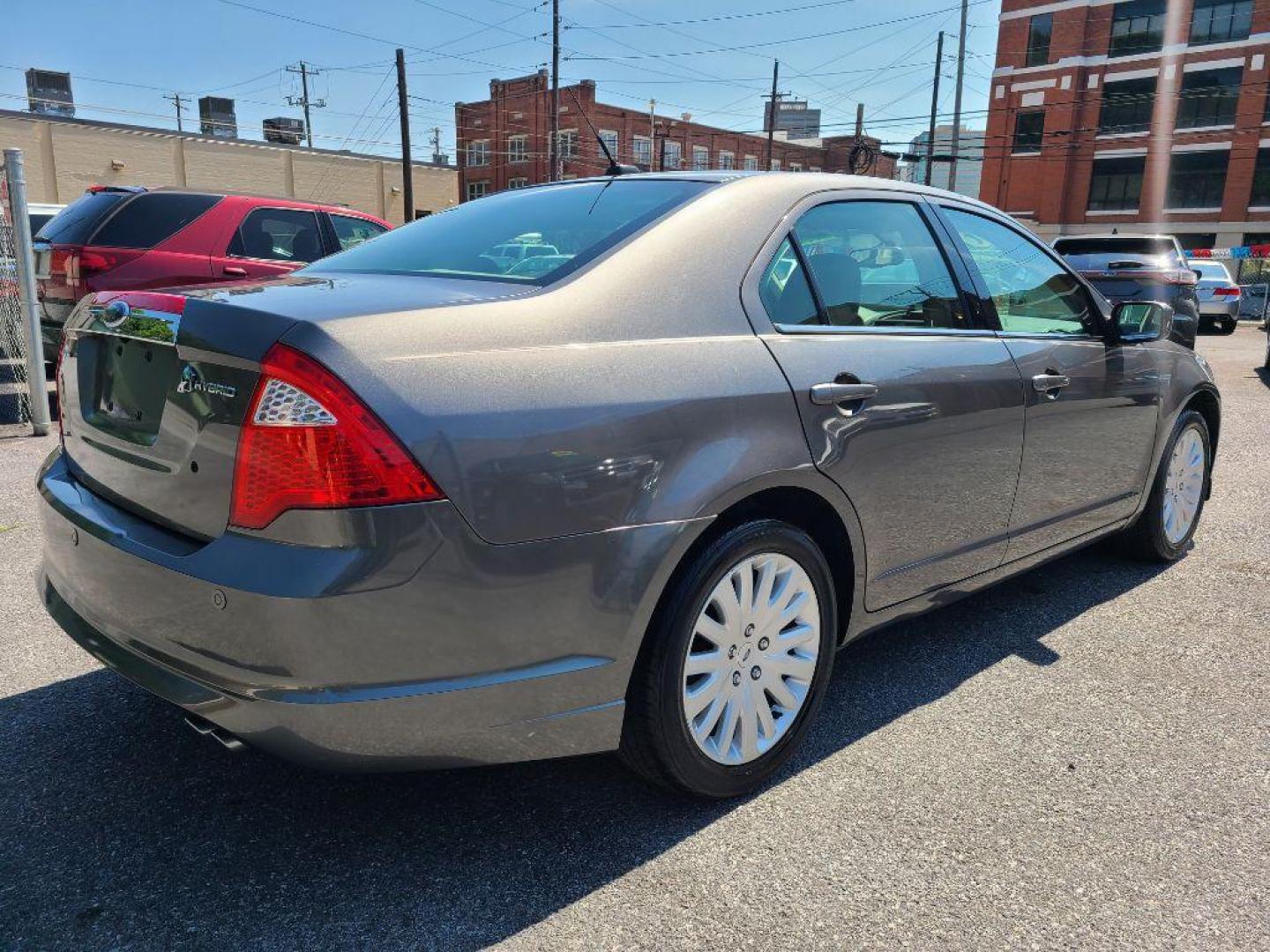 2010 GRAY FORD FUSION HYBRID (3FADP0L37AR) with an 2.5L engine, Continuously Variable transmission, located at 117 North Cameron Street, Harrisburg, PA, 17101, (717) 963-8962, 40.267021, -76.875351 - WE FINANCE!!! Good Credit/ Bad Credit/ No Credit - ALL Trade-Ins Welcomed!!! ***Guaranteed Credit Approval*** APPLY ONLINE or CALL us TODAY ;) Internet Prices and Marketplace Prices are SPECIAL discounted ***CASH DEALS*** Retail Prices are higher. Please call us to discuss your cash and finan - Photo#4