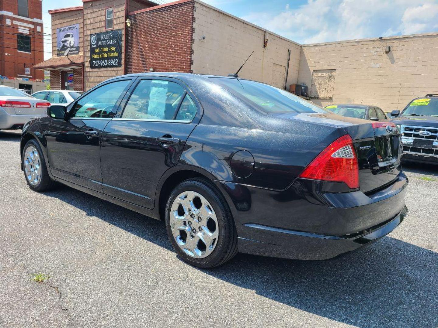 2010 BLACK FORD FUSION SE (3FAHP0HA8AR) with an 2.5L engine, 6-Speed Manual transmission, located at 7981 Paxton Street, Harrisburg, PA, 17111, (717) 561-2926, 40.261490, -76.749229 - WE FINANCE!!! Good Credit/ Bad Credit/ No Credit - ALL Trade-Ins Welcomed!!! ***Guaranteed Credit Approval*** APPLY ONLINE or CALL us TODAY ;) Internet Prices and Marketplace Prices are SPECIAL discounted ***CASH DEALS*** Retail Prices are higher. Please call us to discuss your cash and finan - Photo#2