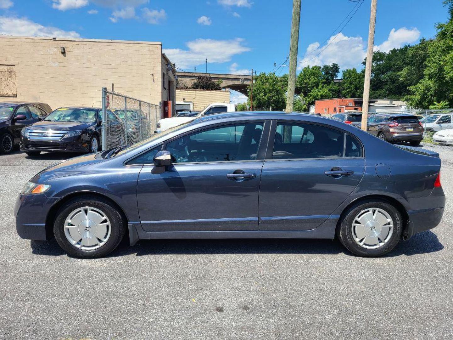 2010 GRAY HONDA CIVIC HYBRID (JHMFA3F2XAS) with an 1.3L engine, Continuously Variable transmission, located at 117 North Cameron Street, Harrisburg, PA, 17101, (717) 963-8962, 40.267021, -76.875351 - WE FINANCE!!! Good Credit/ Bad Credit/ No Credit - ALL Trade-Ins Welcomed!!! ***Guaranteed Credit Approval*** APPLY ONLINE or CALL us TODAY ;) Internet Prices and Marketplace Prices are SPECIAL discounted ***CASH DEALS*** Retail Prices are higher. Please call us to discuss your cash and finan - Photo#1