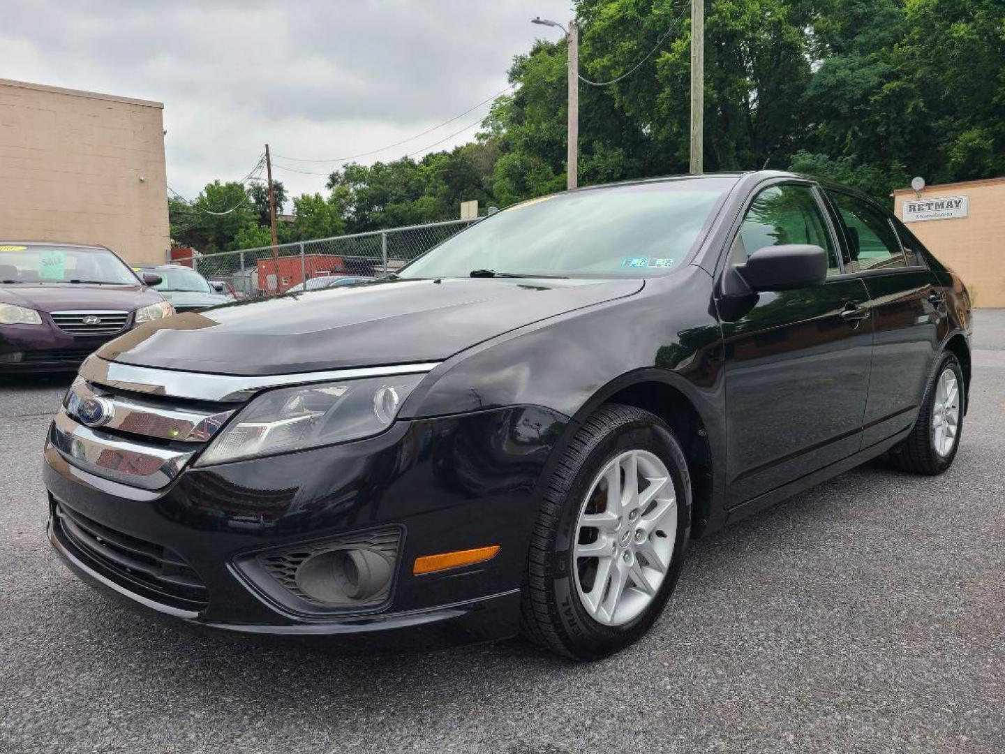 2011 BLACK FORD FUSION S (3FAHP0GAXBR) with an 2.5L engine, Automatic transmission, located at 117 North Cameron Street, Harrisburg, PA, 17101, (717) 963-8962, 40.267021, -76.875351 - Photo#0