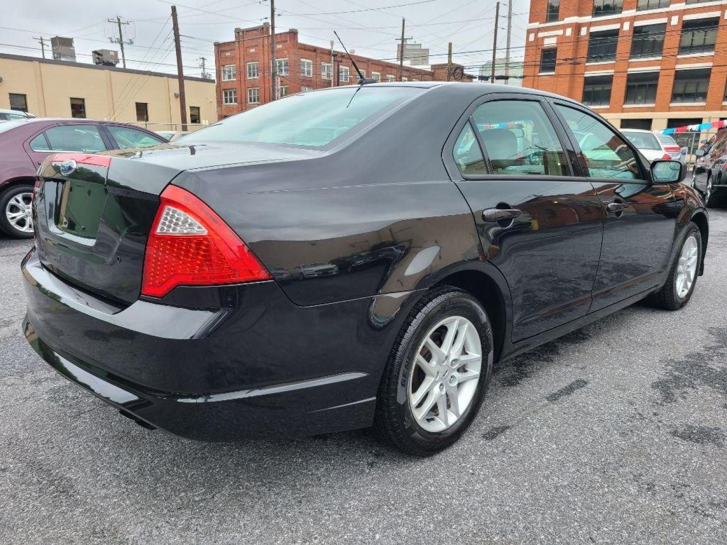 2011 BLACK FORD FUSION S (3FAHP0GAXBR) with an 2.5L engine, Automatic transmission, located at 117 North Cameron Street, Harrisburg, PA, 17101, (717) 963-8962, 40.267021, -76.875351 - Photo#4