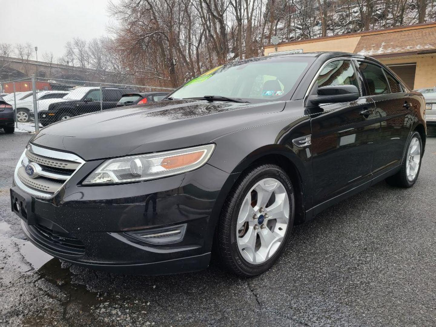 2011 BLACK FORD TAURUS SEL (1FAHP2EW6BG) with an 3.5L engine, Automatic transmission, located at 117 North Cameron Street, Harrisburg, PA, 17101, (717) 963-8962, 40.267021, -76.875351 - WE FINANCE!!! Good Credit/ Bad Credit/ No Credit - ALL Trade-Ins Welcomed!!! ***Guaranteed Credit Approval*** APPLY ONLINE or CALL us TODAY ;) Internet Prices and Marketplace Prices are SPECIAL discounted ***CASH DEALS*** Retail Prices are higher. Please call us to discuss your cash and finan - Photo#0