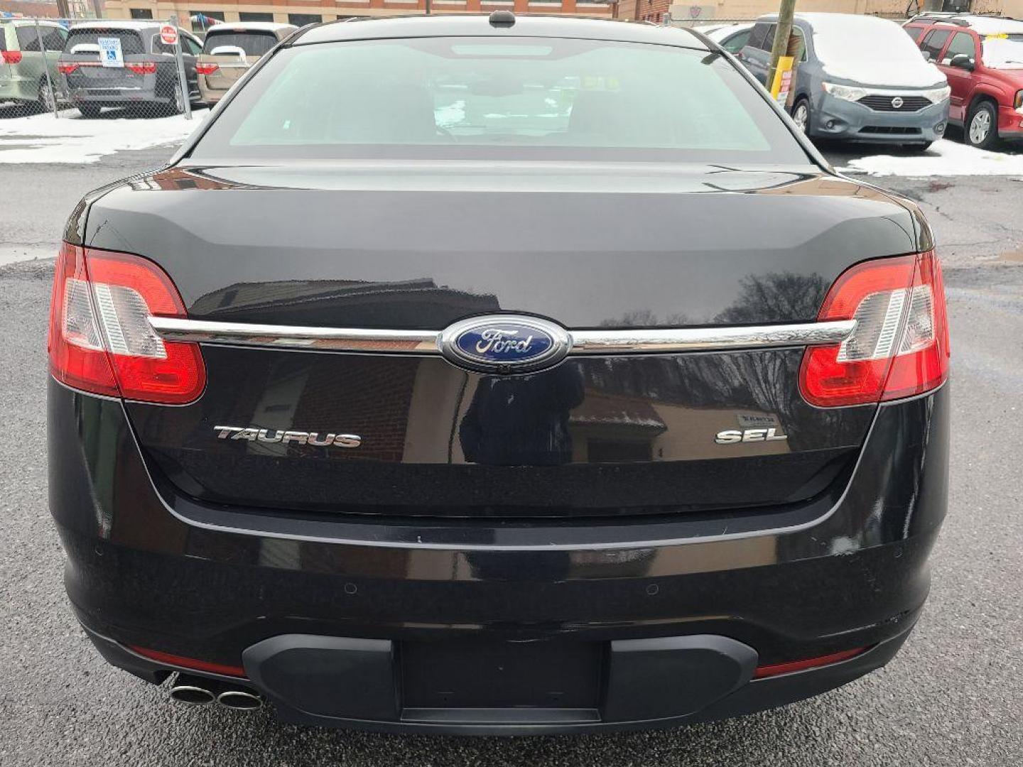 2011 BLACK FORD TAURUS SEL (1FAHP2EW6BG) with an 3.5L engine, Automatic transmission, located at 117 North Cameron Street, Harrisburg, PA, 17101, (717) 963-8962, 40.267021, -76.875351 - WE FINANCE!!! Good Credit/ Bad Credit/ No Credit - ALL Trade-Ins Welcomed!!! ***Guaranteed Credit Approval*** APPLY ONLINE or CALL us TODAY ;) Internet Prices and Marketplace Prices are SPECIAL discounted ***CASH DEALS*** Retail Prices are higher. Please call us to discuss your cash and finan - Photo#3