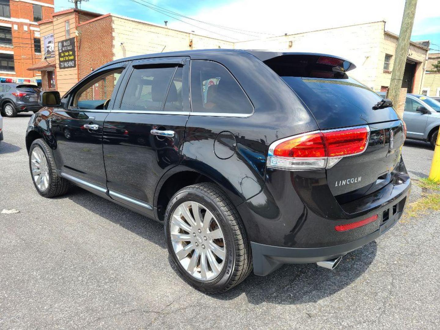 2011 BLACK LINCOLN MKX SUV (2LMDJ8JK9BB) with an 3.7L engine, Automatic transmission, located at 7981 Paxton Street, Harrisburg, PA, 17111, (717) 561-2926, 40.261490, -76.749229 - WE FINANCE!!! Good Credit/ Bad Credit/ No Credit - ALL Trade-Ins Welcomed!!! ***Guaranteed Credit Approval*** APPLY ONLINE or CALL us TODAY ;) Internet Prices and Marketplace Prices are SPECIAL discounted ***CASH DEALS*** Retail Prices are higher. Please call us to discuss your cash and finan - Photo#2