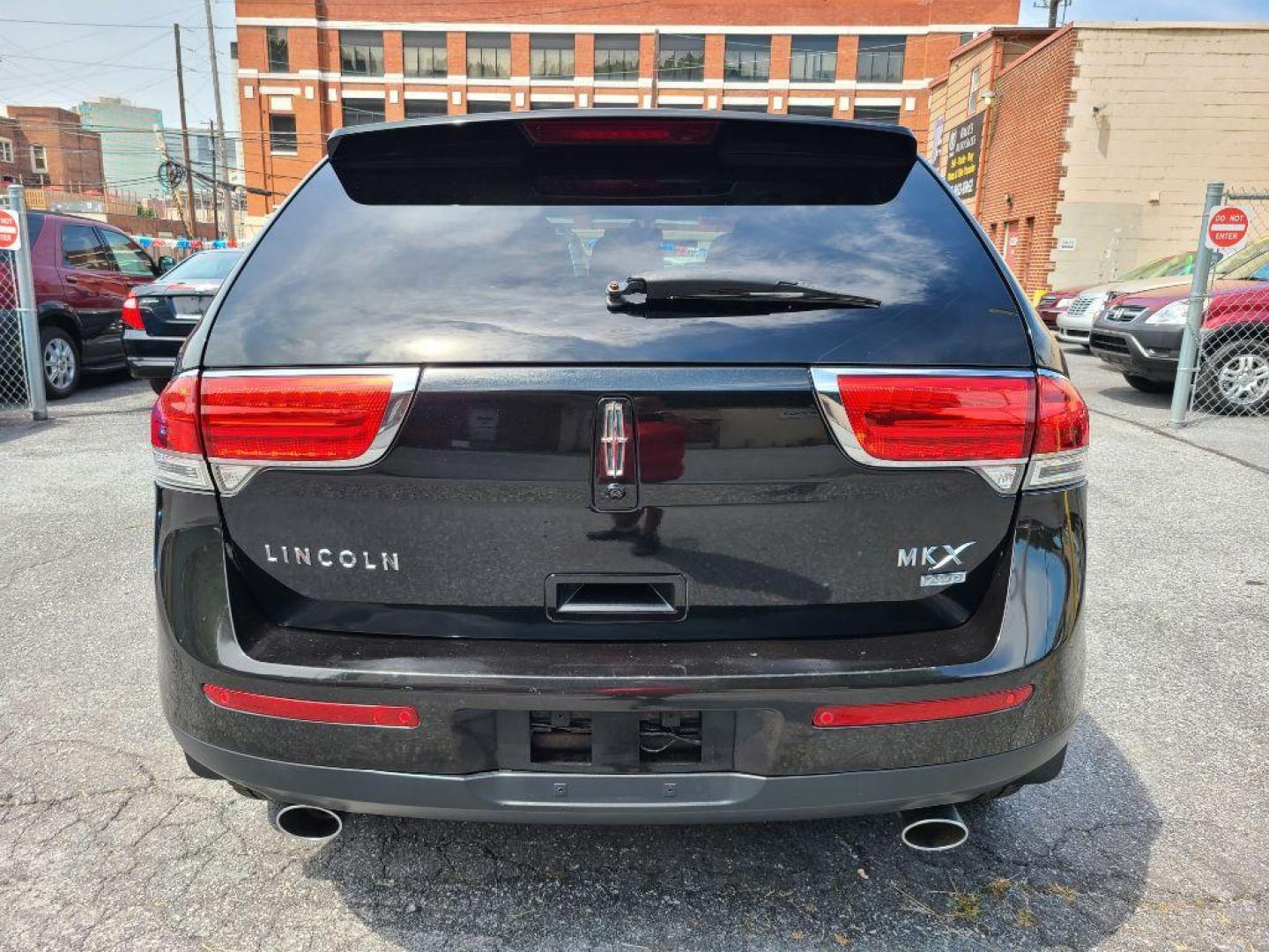 2011 BLACK LINCOLN MKX SUV (2LMDJ8JK9BB) with an 3.7L engine, Automatic transmission, located at 7981 Paxton Street, Harrisburg, PA, 17111, (717) 561-2926, 40.261490, -76.749229 - WE FINANCE!!! Good Credit/ Bad Credit/ No Credit - ALL Trade-Ins Welcomed!!! ***Guaranteed Credit Approval*** APPLY ONLINE or CALL us TODAY ;) Internet Prices and Marketplace Prices are SPECIAL discounted ***CASH DEALS*** Retail Prices are higher. Please call us to discuss your cash and finan - Photo#3