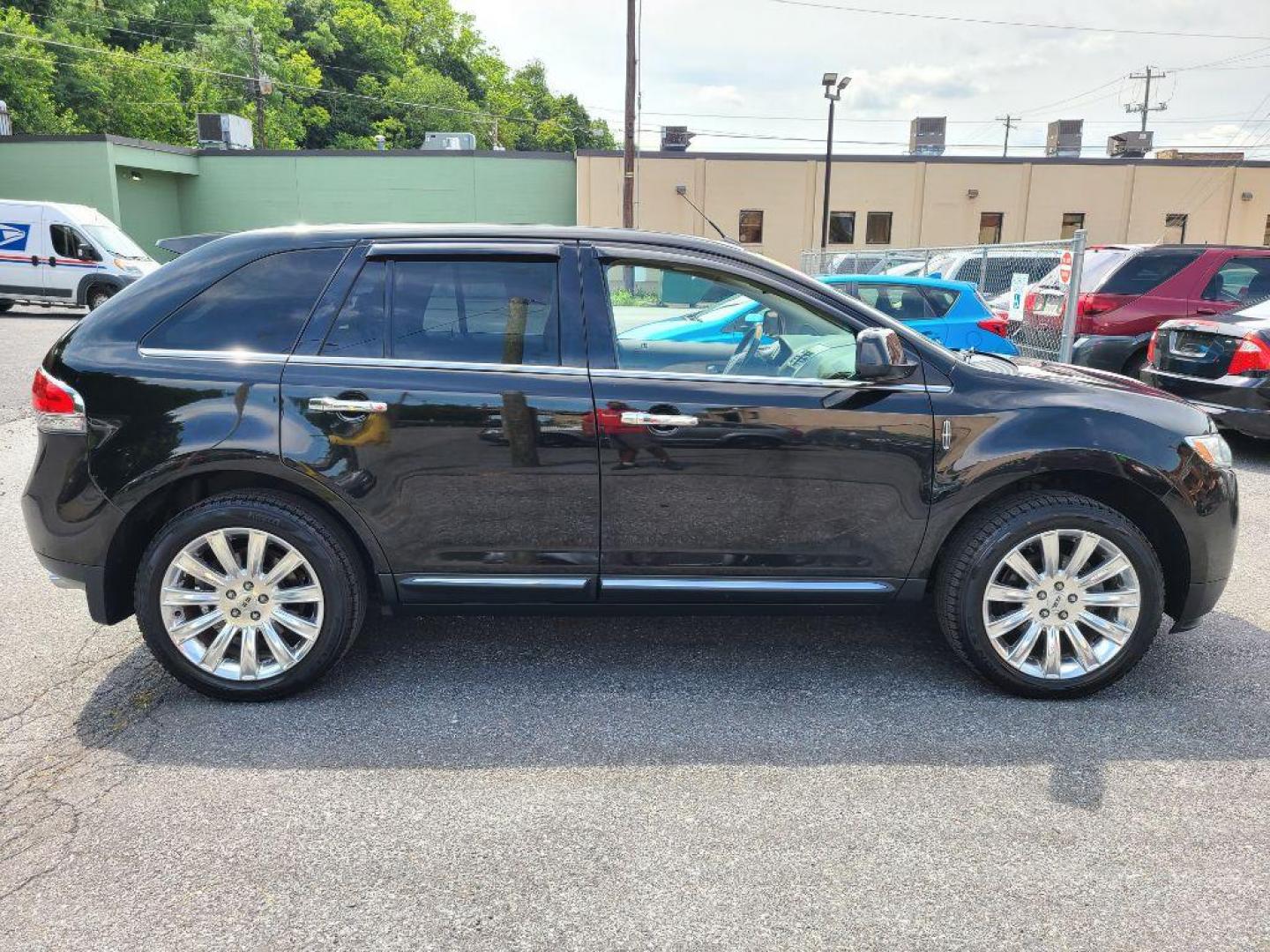 2011 BLACK LINCOLN MKX SUV (2LMDJ8JK9BB) with an 3.7L engine, Automatic transmission, located at 7981 Paxton Street, Harrisburg, PA, 17111, (717) 561-2926, 40.261490, -76.749229 - WE FINANCE!!! Good Credit/ Bad Credit/ No Credit - ALL Trade-Ins Welcomed!!! ***Guaranteed Credit Approval*** APPLY ONLINE or CALL us TODAY ;) Internet Prices and Marketplace Prices are SPECIAL discounted ***CASH DEALS*** Retail Prices are higher. Please call us to discuss your cash and finan - Photo#5