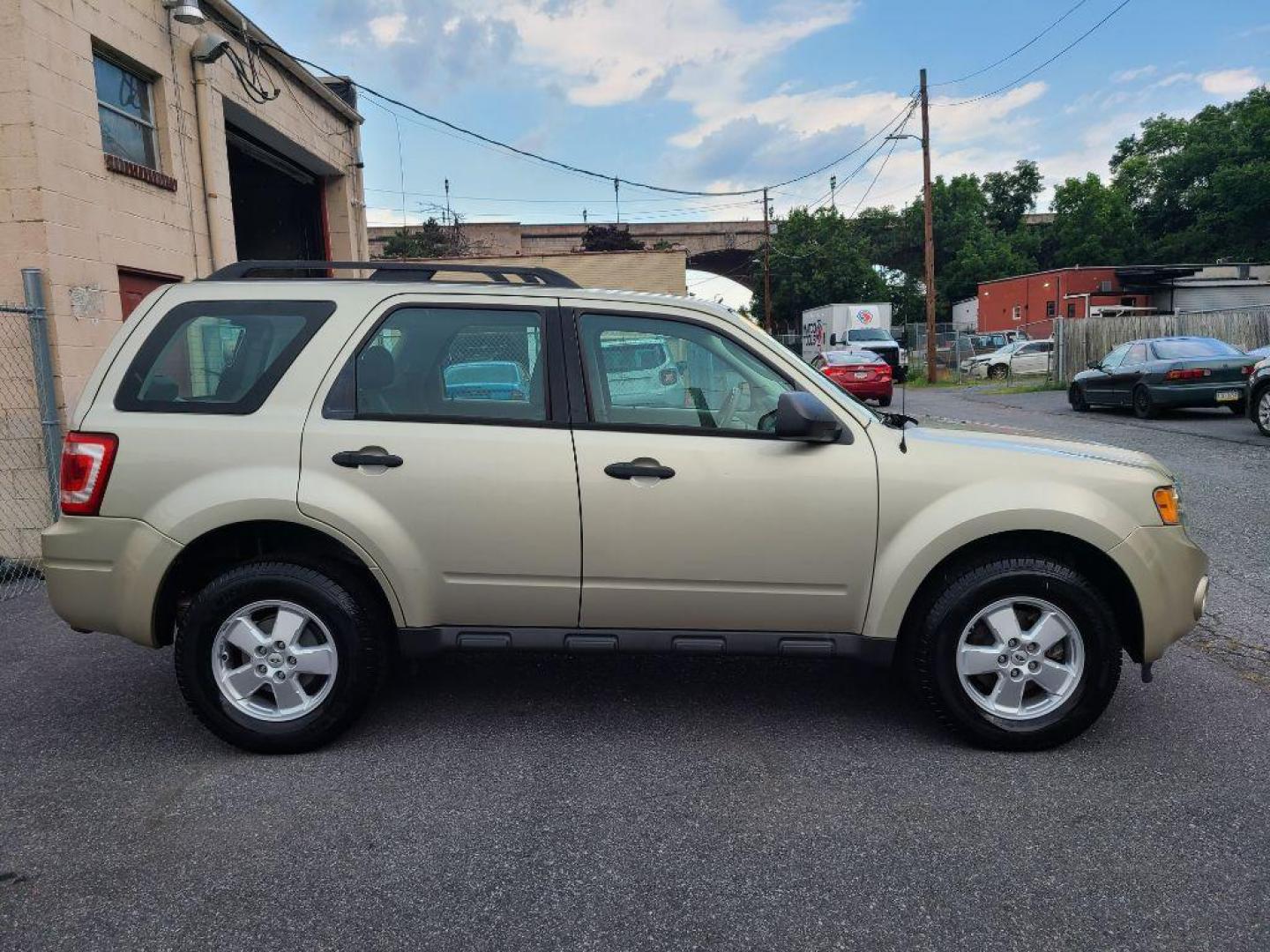 2012 GOLD FORD ESCAPE XLS (1FMCU0C73CK) with an 2.5L engine, Automatic transmission, located at 7981 Paxton Street, Harrisburg, PA, 17111, (717) 561-2926, 40.261490, -76.749229 - WE FINANCE!!! Good Credit/ Bad Credit/ No Credit - ALL Trade-Ins Welcomed!!! ***Guaranteed Credit Approval*** APPLY ONLINE or CALL us TODAY ;) Internet Prices and Marketplace Prices are SPECIAL discounted ***CASH DEALS*** Retail Prices are higher. Please call us to discuss your cash and finan - Photo#5