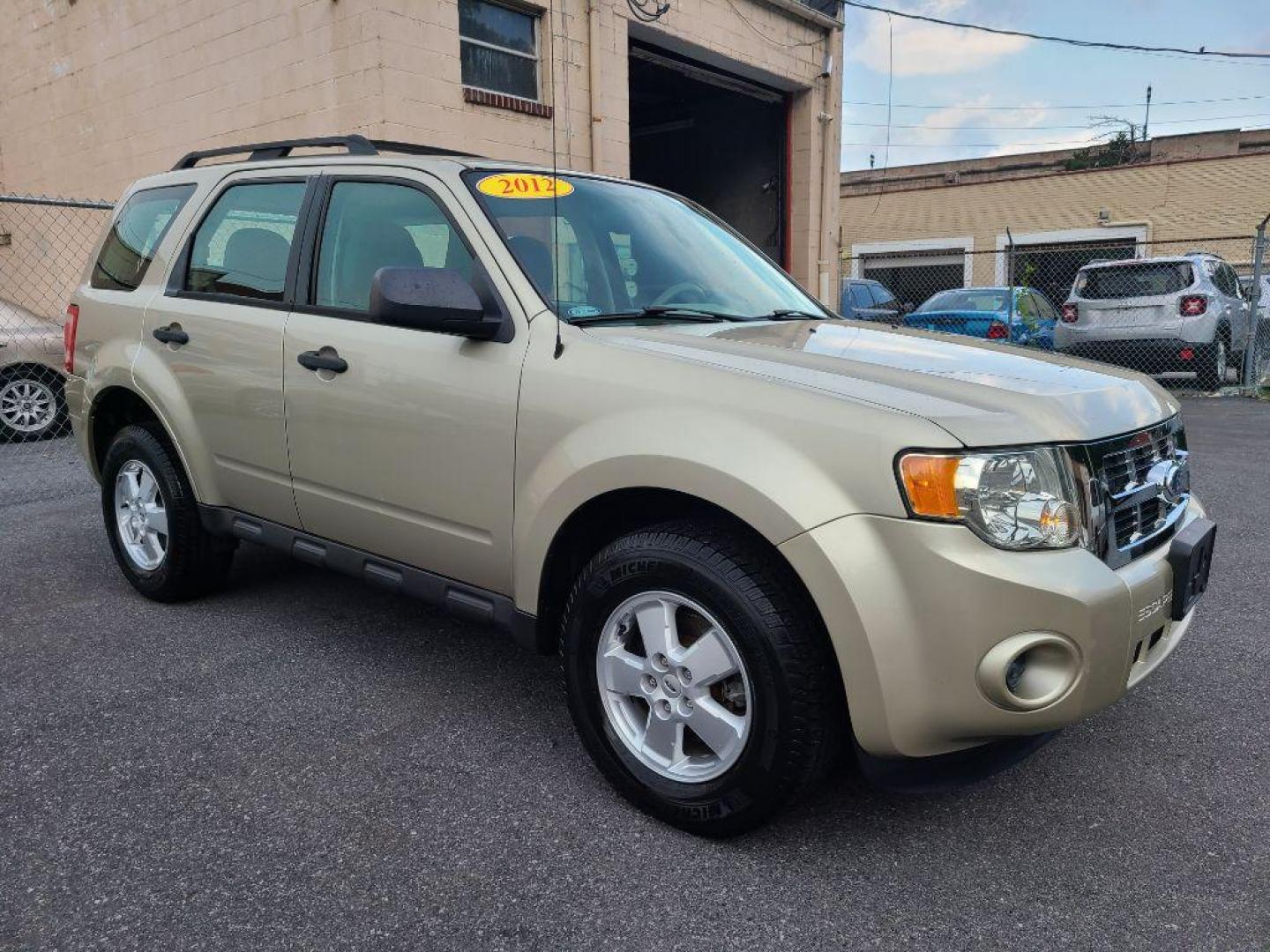 2012 GOLD FORD ESCAPE XLS (1FMCU0C73CK) with an 2.5L engine, Automatic transmission, located at 7981 Paxton Street, Harrisburg, PA, 17111, (717) 561-2926, 40.261490, -76.749229 - WE FINANCE!!! Good Credit/ Bad Credit/ No Credit - ALL Trade-Ins Welcomed!!! ***Guaranteed Credit Approval*** APPLY ONLINE or CALL us TODAY ;) Internet Prices and Marketplace Prices are SPECIAL discounted ***CASH DEALS*** Retail Prices are higher. Please call us to discuss your cash and finan - Photo#6