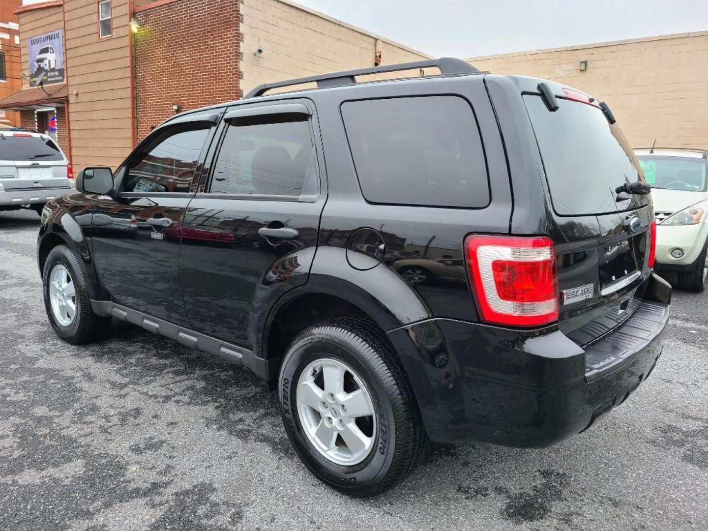 2012 BLACK FORD ESCAPE XLT (1FMCU9D74CK) with an 2.5L engine, Automatic transmission, located at 117 North Cameron Street, Harrisburg, PA, 17101, (717) 963-8962, 40.267021, -76.875351 - WE FINANCE!!! Good Credit/ Bad Credit/ No Credit - ALL Trade-Ins Welcomed!!! ***Guaranteed Credit Approval*** APPLY ONLINE or CALL us TODAY ;) Internet Prices and Marketplace Prices are SPECIAL discounted ***CASH DEALS*** Retail Prices are higher. Please call us to discuss your cash and finan - Photo#2