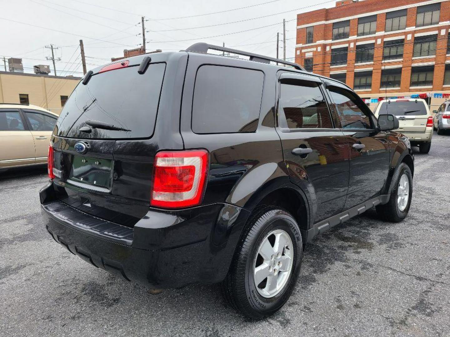 2012 BLACK FORD ESCAPE XLT (1FMCU9D74CK) with an 2.5L engine, Automatic transmission, located at 117 North Cameron Street, Harrisburg, PA, 17101, (717) 963-8962, 40.267021, -76.875351 - WE FINANCE!!! Good Credit/ Bad Credit/ No Credit - ALL Trade-Ins Welcomed!!! ***Guaranteed Credit Approval*** APPLY ONLINE or CALL us TODAY ;) Internet Prices and Marketplace Prices are SPECIAL discounted ***CASH DEALS*** Retail Prices are higher. Please call us to discuss your cash and finan - Photo#4