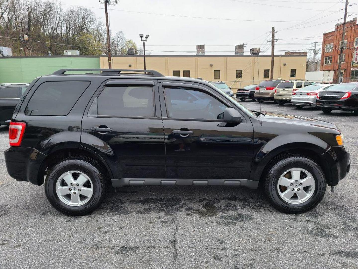 2012 BLACK FORD ESCAPE XLT (1FMCU9D74CK) with an 2.5L engine, Automatic transmission, located at 117 North Cameron Street, Harrisburg, PA, 17101, (717) 963-8962, 40.267021, -76.875351 - WE FINANCE!!! Good Credit/ Bad Credit/ No Credit - ALL Trade-Ins Welcomed!!! ***Guaranteed Credit Approval*** APPLY ONLINE or CALL us TODAY ;) Internet Prices and Marketplace Prices are SPECIAL discounted ***CASH DEALS*** Retail Prices are higher. Please call us to discuss your cash and finan - Photo#5