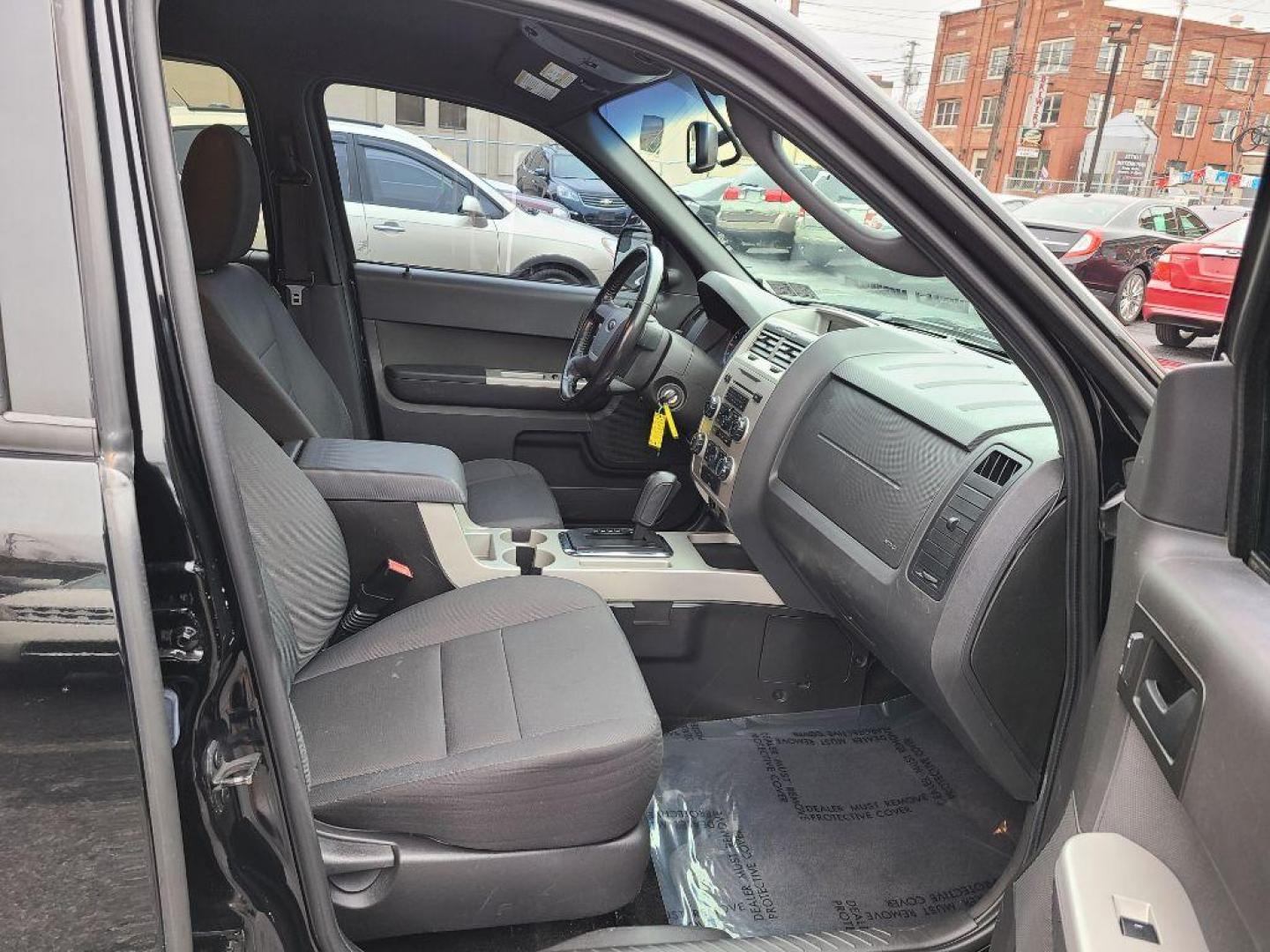 2012 BLACK FORD ESCAPE XLT (1FMCU9D74CK) with an 2.5L engine, Automatic transmission, located at 117 North Cameron Street, Harrisburg, PA, 17101, (717) 963-8962, 40.267021, -76.875351 - WE FINANCE!!! Good Credit/ Bad Credit/ No Credit - ALL Trade-Ins Welcomed!!! ***Guaranteed Credit Approval*** APPLY ONLINE or CALL us TODAY ;) Internet Prices and Marketplace Prices are SPECIAL discounted ***CASH DEALS*** Retail Prices are higher. Please call us to discuss your cash and finan - Photo#8