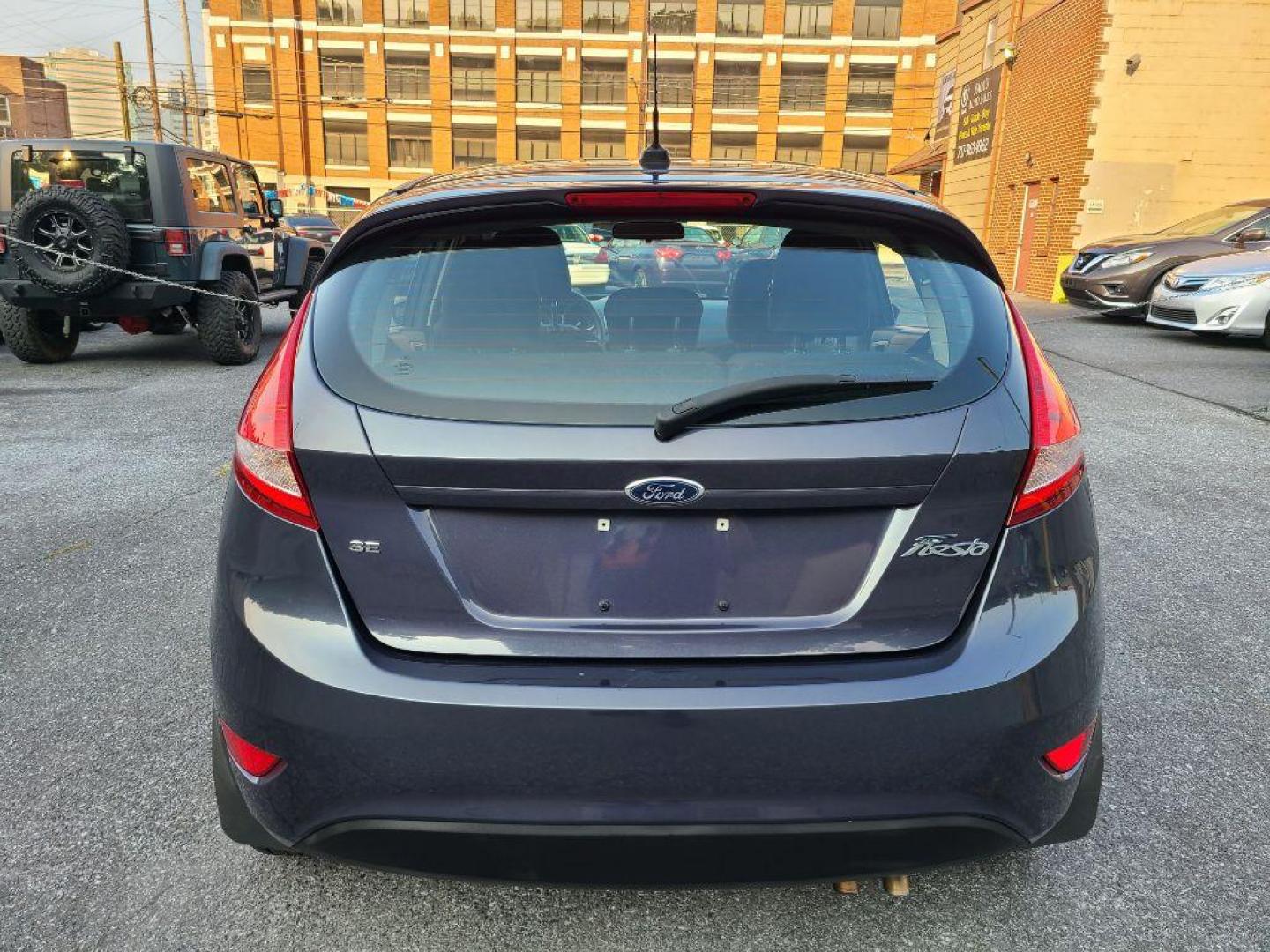 2012 GRAY FORD FIESTA SE (3FADP4EJ0CM) with an 1.6L engine, Automatic transmission, located at 117 North Cameron Street, Harrisburg, PA, 17101, (717) 963-8962, 40.267021, -76.875351 - Photo#3