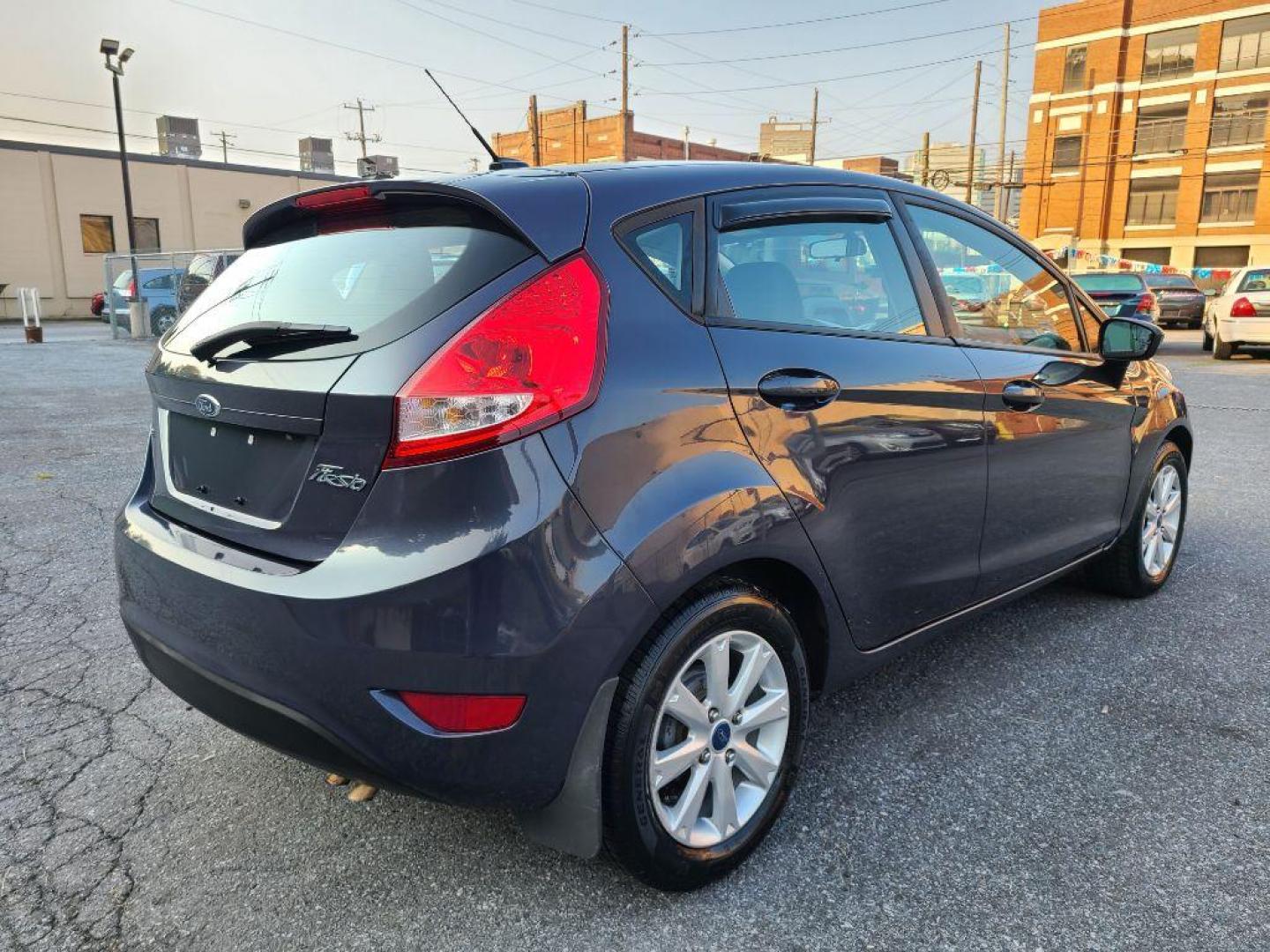 2012 GRAY FORD FIESTA SE (3FADP4EJ0CM) with an 1.6L engine, Automatic transmission, located at 117 North Cameron Street, Harrisburg, PA, 17101, (717) 963-8962, 40.267021, -76.875351 - Photo#4