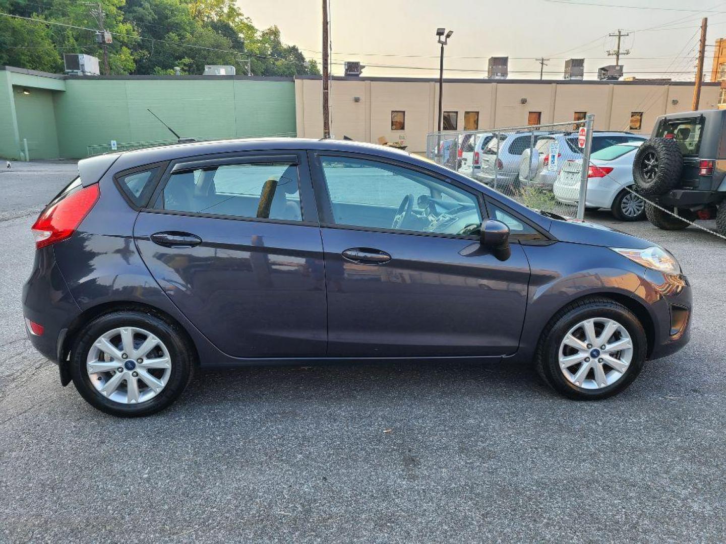 2012 GRAY FORD FIESTA SE (3FADP4EJ0CM) with an 1.6L engine, Automatic transmission, located at 117 North Cameron Street, Harrisburg, PA, 17101, (717) 963-8962, 40.267021, -76.875351 - Photo#5