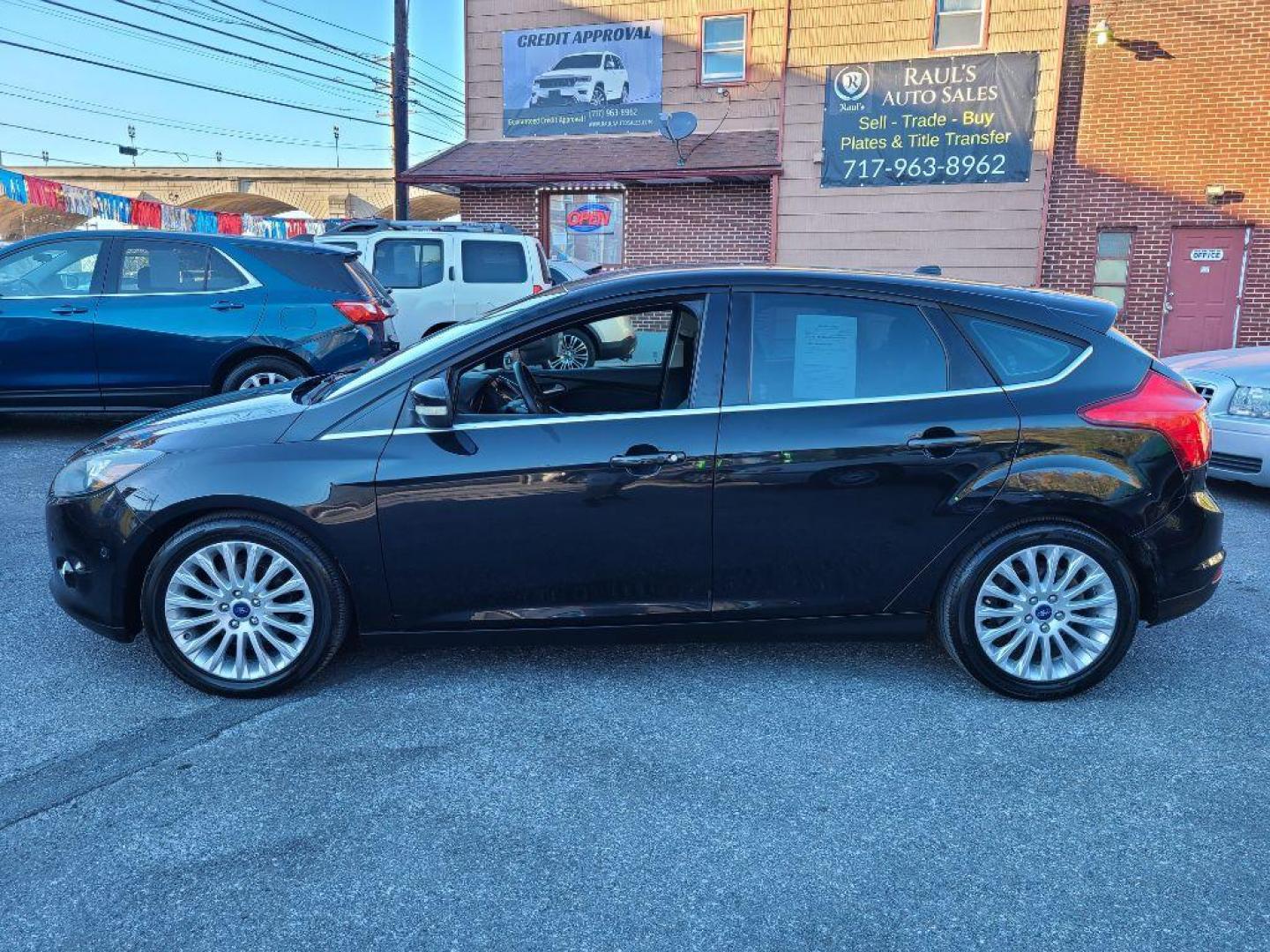 2012 BLACK FORD FOCUS TITANIUM (1FAHP3N27CL) with an 2.0L engine, Automatic transmission, located at 117 North Cameron Street, Harrisburg, PA, 17101, (717) 963-8962, 40.267021, -76.875351 - WE FINANCE!!! Good Credit/ Bad Credit/ No Credit - ALL Trade-Ins Welcomed!!! ***Guaranteed Credit Approval*** APPLY ONLINE or CALL us TODAY ;) Internet Prices and Marketplace Prices are SPECIAL discounted ***CASH DEALS*** Retail Prices are higher. Please call us to discuss your cash and finan - Photo#1