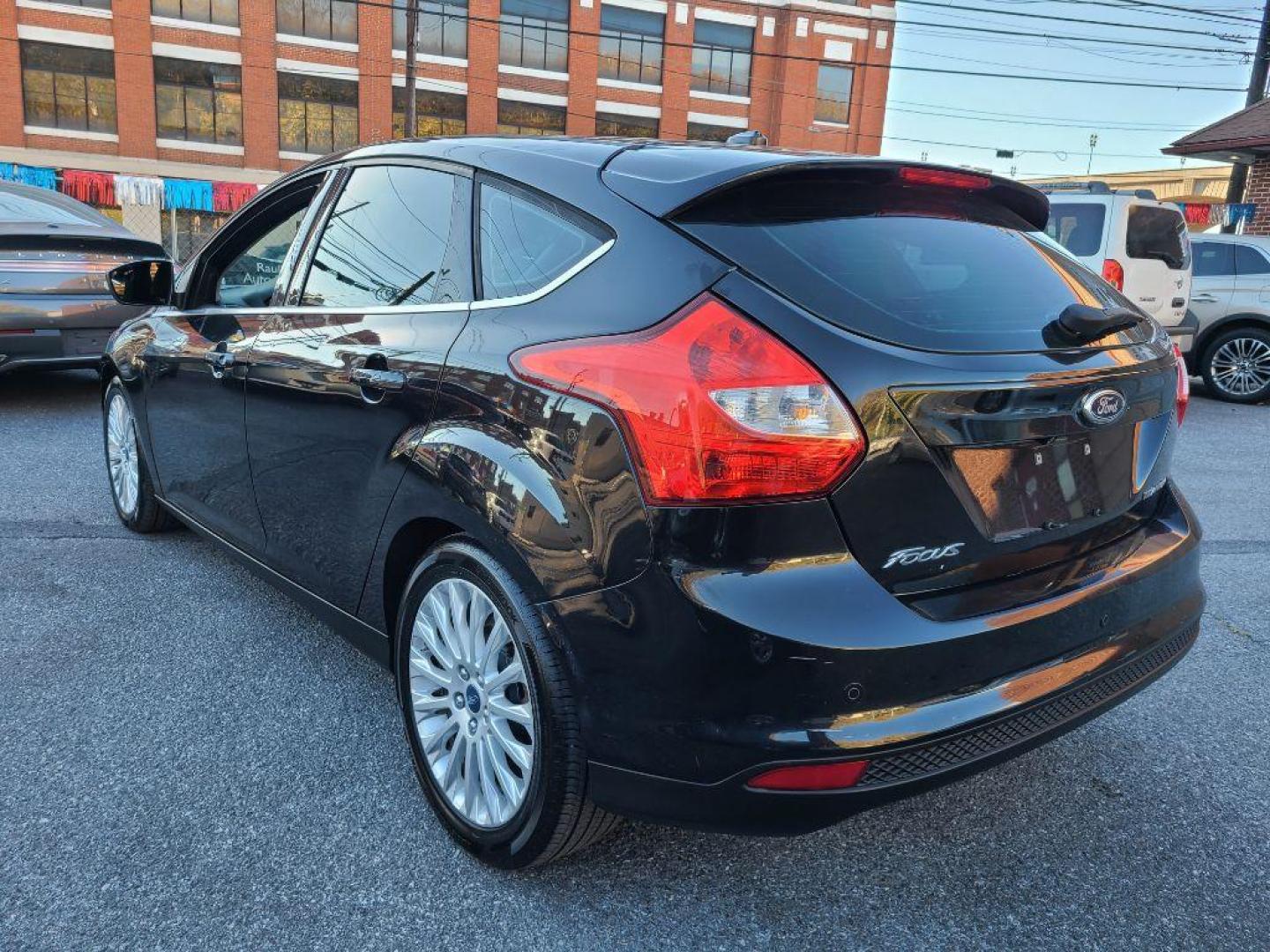 2012 BLACK FORD FOCUS TITANIUM (1FAHP3N27CL) with an 2.0L engine, Automatic transmission, located at 117 North Cameron Street, Harrisburg, PA, 17101, (717) 963-8962, 40.267021, -76.875351 - WE FINANCE!!! Good Credit/ Bad Credit/ No Credit - ALL Trade-Ins Welcomed!!! ***Guaranteed Credit Approval*** APPLY ONLINE or CALL us TODAY ;) Internet Prices and Marketplace Prices are SPECIAL discounted ***CASH DEALS*** Retail Prices are higher. Please call us to discuss your cash and finan - Photo#2