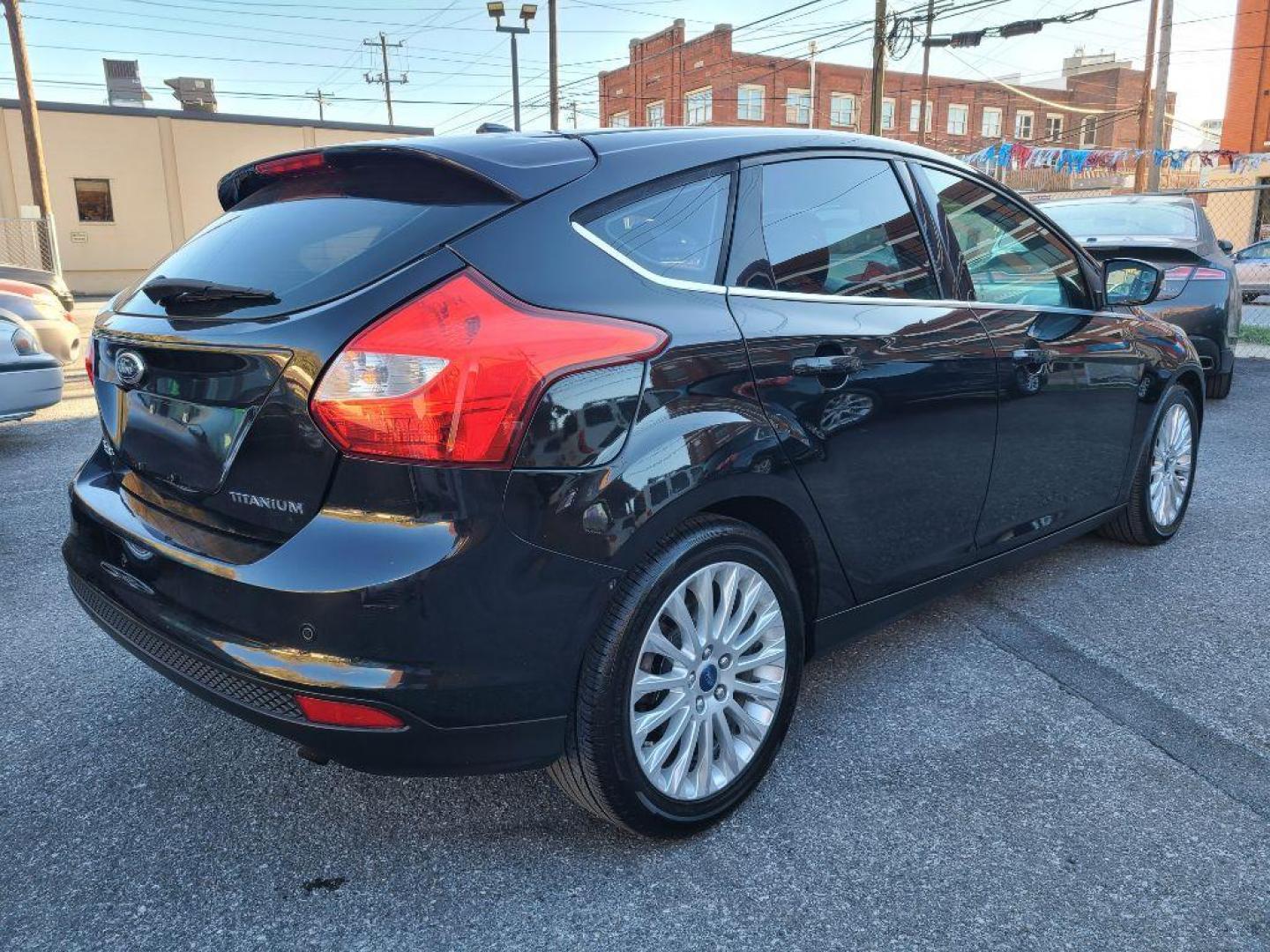 2012 BLACK FORD FOCUS TITANIUM (1FAHP3N27CL) with an 2.0L engine, Automatic transmission, located at 117 North Cameron Street, Harrisburg, PA, 17101, (717) 963-8962, 40.267021, -76.875351 - WE FINANCE!!! Good Credit/ Bad Credit/ No Credit - ALL Trade-Ins Welcomed!!! ***Guaranteed Credit Approval*** APPLY ONLINE or CALL us TODAY ;) Internet Prices and Marketplace Prices are SPECIAL discounted ***CASH DEALS*** Retail Prices are higher. Please call us to discuss your cash and finan - Photo#4