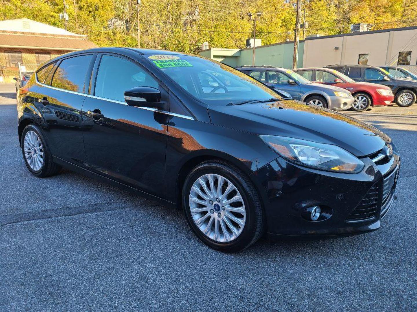 2012 BLACK FORD FOCUS TITANIUM (1FAHP3N27CL) with an 2.0L engine, Automatic transmission, located at 117 North Cameron Street, Harrisburg, PA, 17101, (717) 963-8962, 40.267021, -76.875351 - WE FINANCE!!! Good Credit/ Bad Credit/ No Credit - ALL Trade-Ins Welcomed!!! ***Guaranteed Credit Approval*** APPLY ONLINE or CALL us TODAY ;) Internet Prices and Marketplace Prices are SPECIAL discounted ***CASH DEALS*** Retail Prices are higher. Please call us to discuss your cash and finan - Photo#6