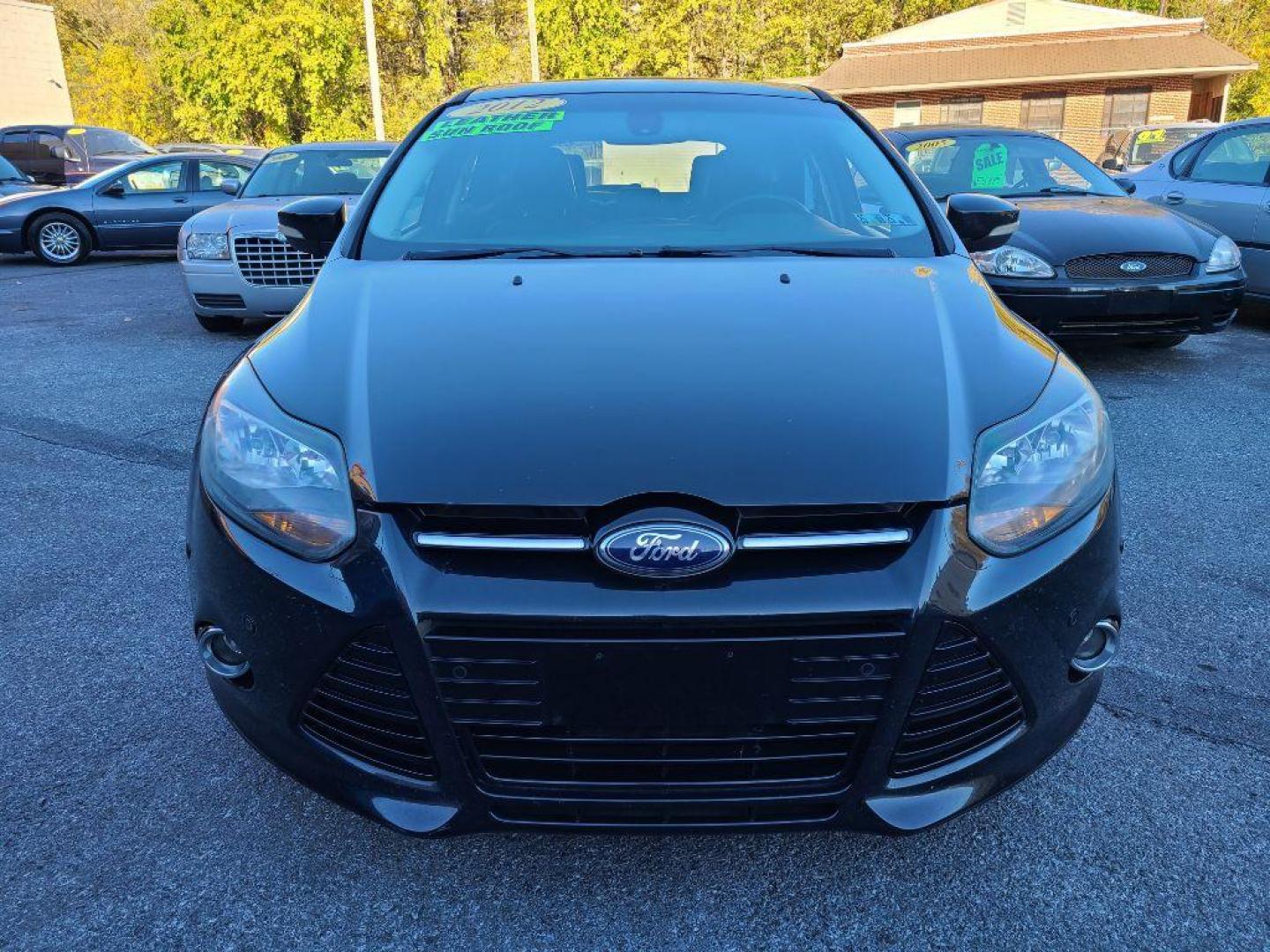 2012 BLACK FORD FOCUS TITANIUM (1FAHP3N27CL) with an 2.0L engine, Automatic transmission, located at 117 North Cameron Street, Harrisburg, PA, 17101, (717) 963-8962, 40.267021, -76.875351 - WE FINANCE!!! Good Credit/ Bad Credit/ No Credit - ALL Trade-Ins Welcomed!!! ***Guaranteed Credit Approval*** APPLY ONLINE or CALL us TODAY ;) Internet Prices and Marketplace Prices are SPECIAL discounted ***CASH DEALS*** Retail Prices are higher. Please call us to discuss your cash and finan - Photo#7