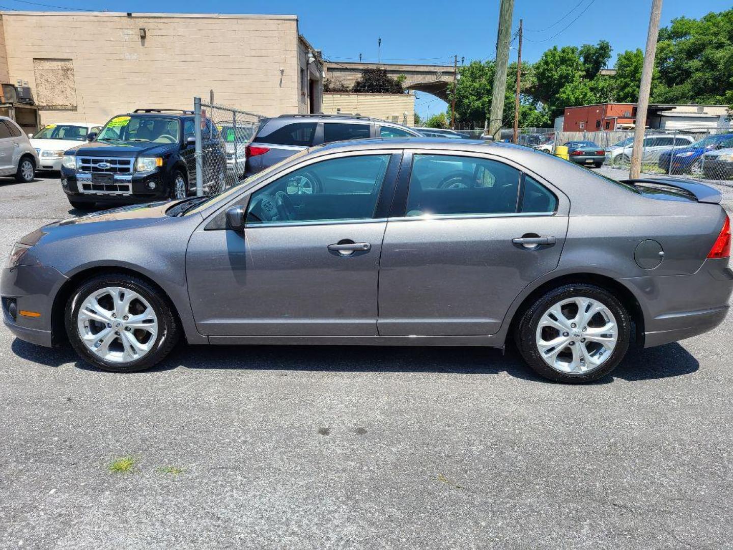 2012 GRAY FORD FUSION SE (3FAHP0HA0CR) with an 2.5L engine, Automatic transmission, located at 117 North Cameron Street, Harrisburg, PA, 17101, (717) 963-8962, 40.267021, -76.875351 - WE FINANCE!!! Good Credit/ Bad Credit/ No Credit - ALL Trade-Ins Welcomed!!! ***Guaranteed Credit Approval*** APPLY ONLINE or CALL us TODAY ;) Internet Prices and Marketplace Prices are SPECIAL discounted ***CASH DEALS*** Retail Prices are higher. Please call us to discuss your cash and finan - Photo#1