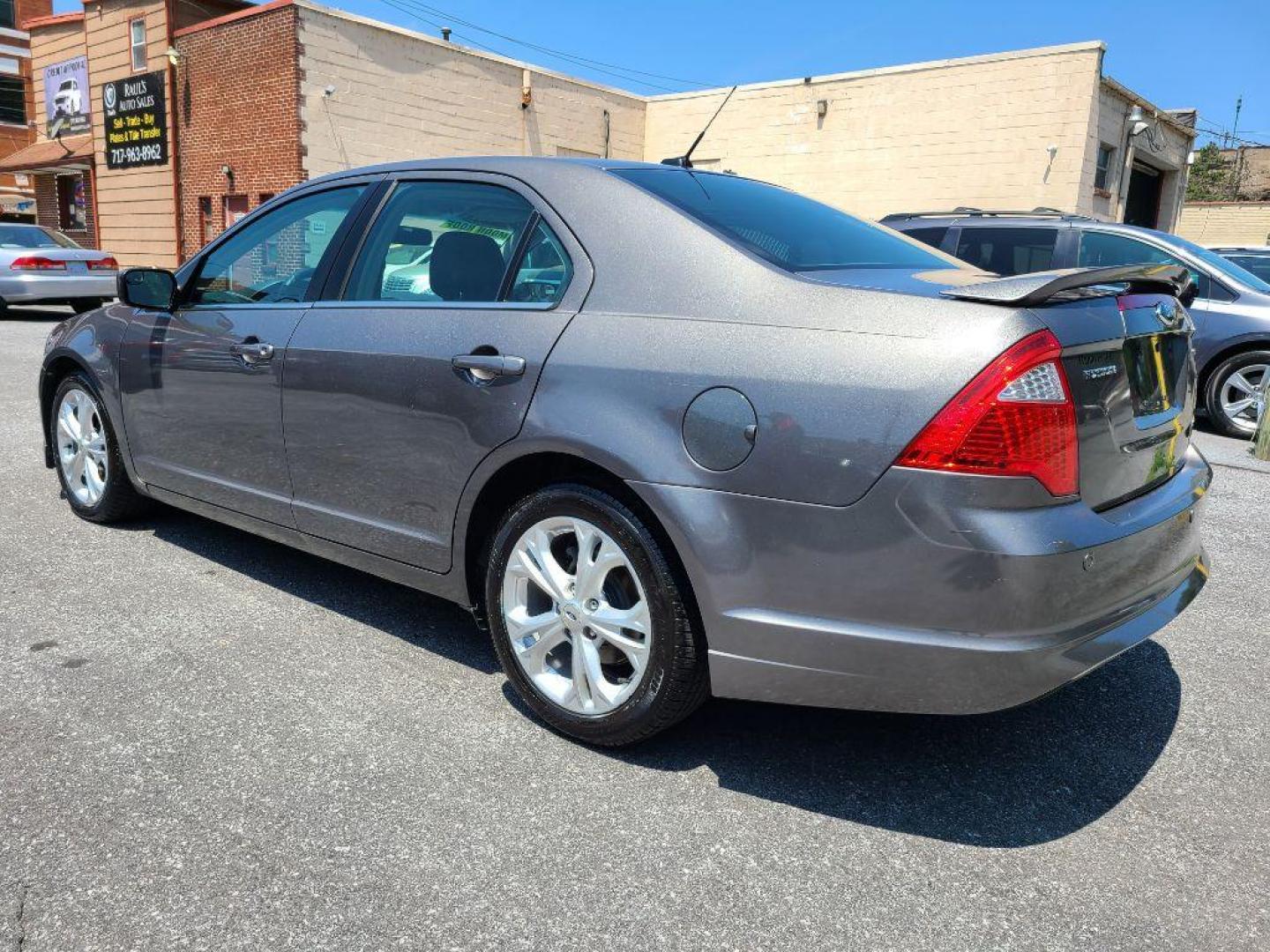 2012 GRAY FORD FUSION SE (3FAHP0HA0CR) with an 2.5L engine, Automatic transmission, located at 117 North Cameron Street, Harrisburg, PA, 17101, (717) 963-8962, 40.267021, -76.875351 - WE FINANCE!!! Good Credit/ Bad Credit/ No Credit - ALL Trade-Ins Welcomed!!! ***Guaranteed Credit Approval*** APPLY ONLINE or CALL us TODAY ;) Internet Prices and Marketplace Prices are SPECIAL discounted ***CASH DEALS*** Retail Prices are higher. Please call us to discuss your cash and finan - Photo#2