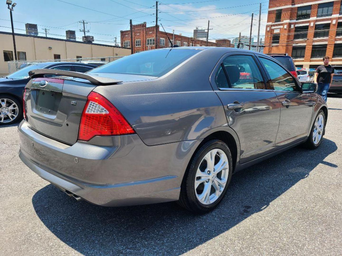 2012 GRAY FORD FUSION SE (3FAHP0HA0CR) with an 2.5L engine, Automatic transmission, located at 117 North Cameron Street, Harrisburg, PA, 17101, (717) 963-8962, 40.267021, -76.875351 - WE FINANCE!!! Good Credit/ Bad Credit/ No Credit - ALL Trade-Ins Welcomed!!! ***Guaranteed Credit Approval*** APPLY ONLINE or CALL us TODAY ;) Internet Prices and Marketplace Prices are SPECIAL discounted ***CASH DEALS*** Retail Prices are higher. Please call us to discuss your cash and finan - Photo#4