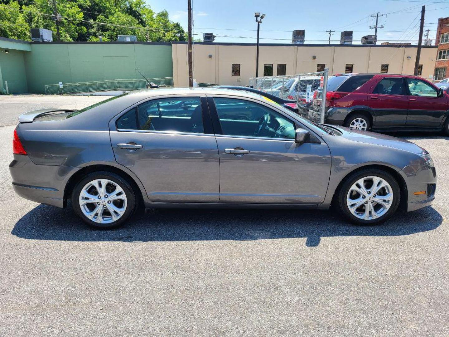 2012 GRAY FORD FUSION SE (3FAHP0HA0CR) with an 2.5L engine, Automatic transmission, located at 117 North Cameron Street, Harrisburg, PA, 17101, (717) 963-8962, 40.267021, -76.875351 - WE FINANCE!!! Good Credit/ Bad Credit/ No Credit - ALL Trade-Ins Welcomed!!! ***Guaranteed Credit Approval*** APPLY ONLINE or CALL us TODAY ;) Internet Prices and Marketplace Prices are SPECIAL discounted ***CASH DEALS*** Retail Prices are higher. Please call us to discuss your cash and finan - Photo#5